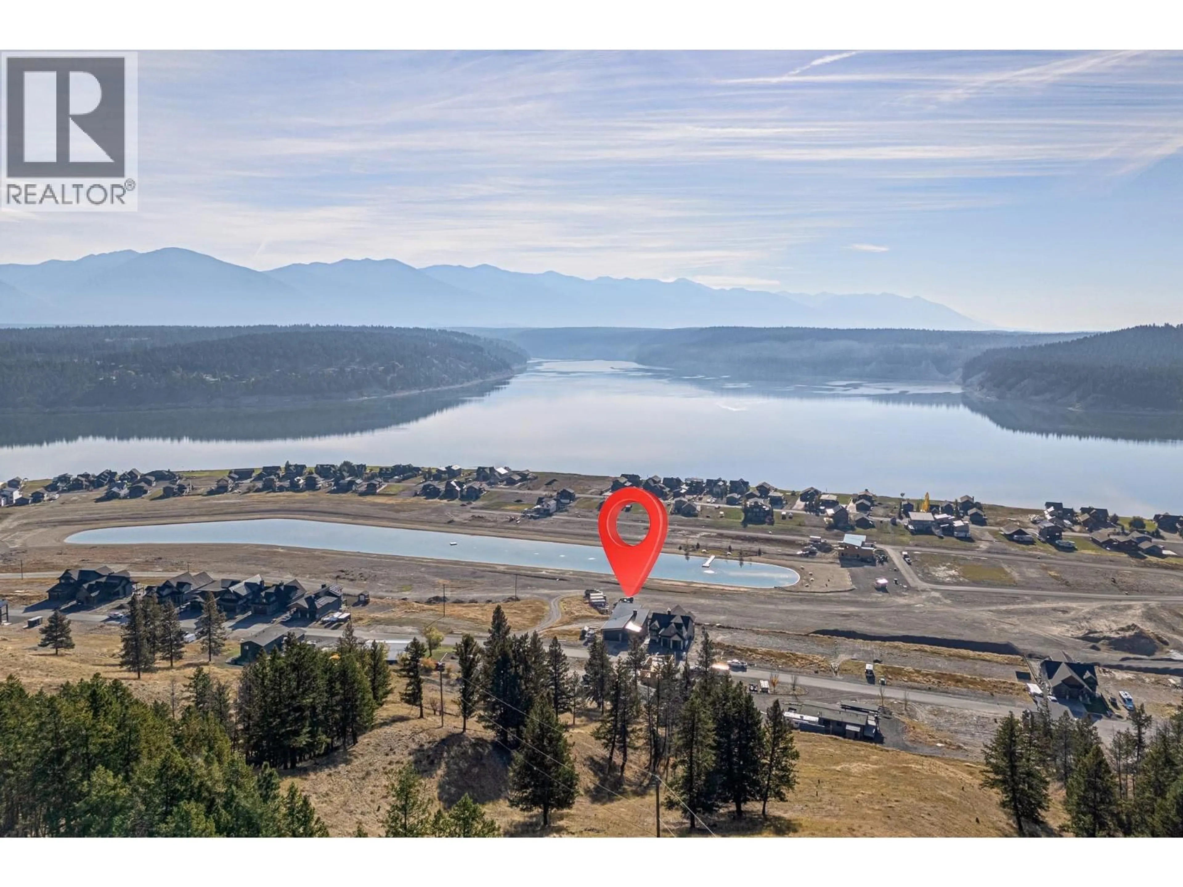 A pic from outside/outdoor area/front of a property/back of a property/a pic from drone, water/lake/river/ocean view for 1650 TERRACE DRIVE, Lake Koocanusa British Columbia V0B1T4