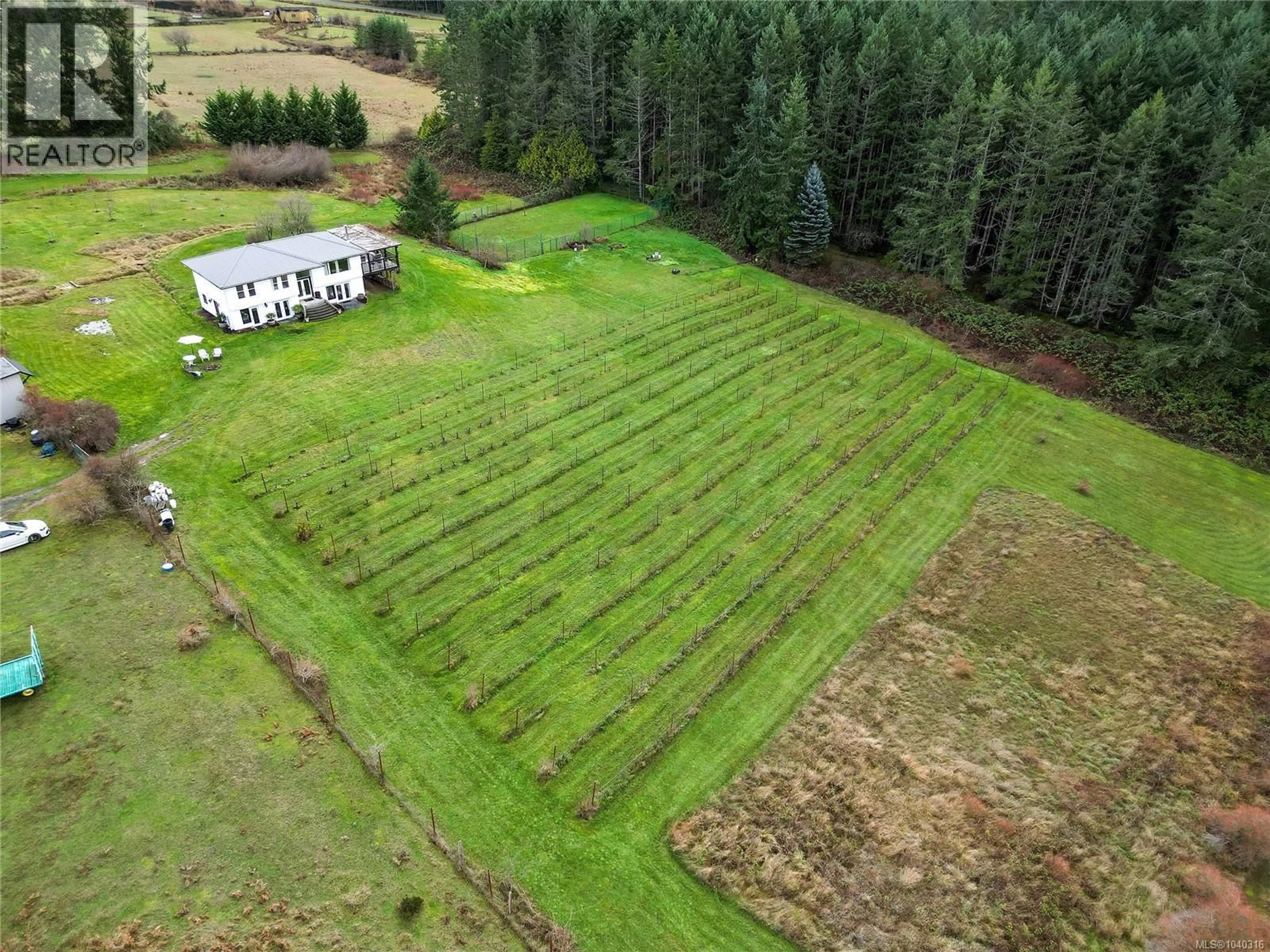 A pic from outside/outdoor area/front of a property/back of a property/a pic from drone, forest/trees view for 300 WOOD DALE DRIVE, Mayne Island British Columbia V0N2J2