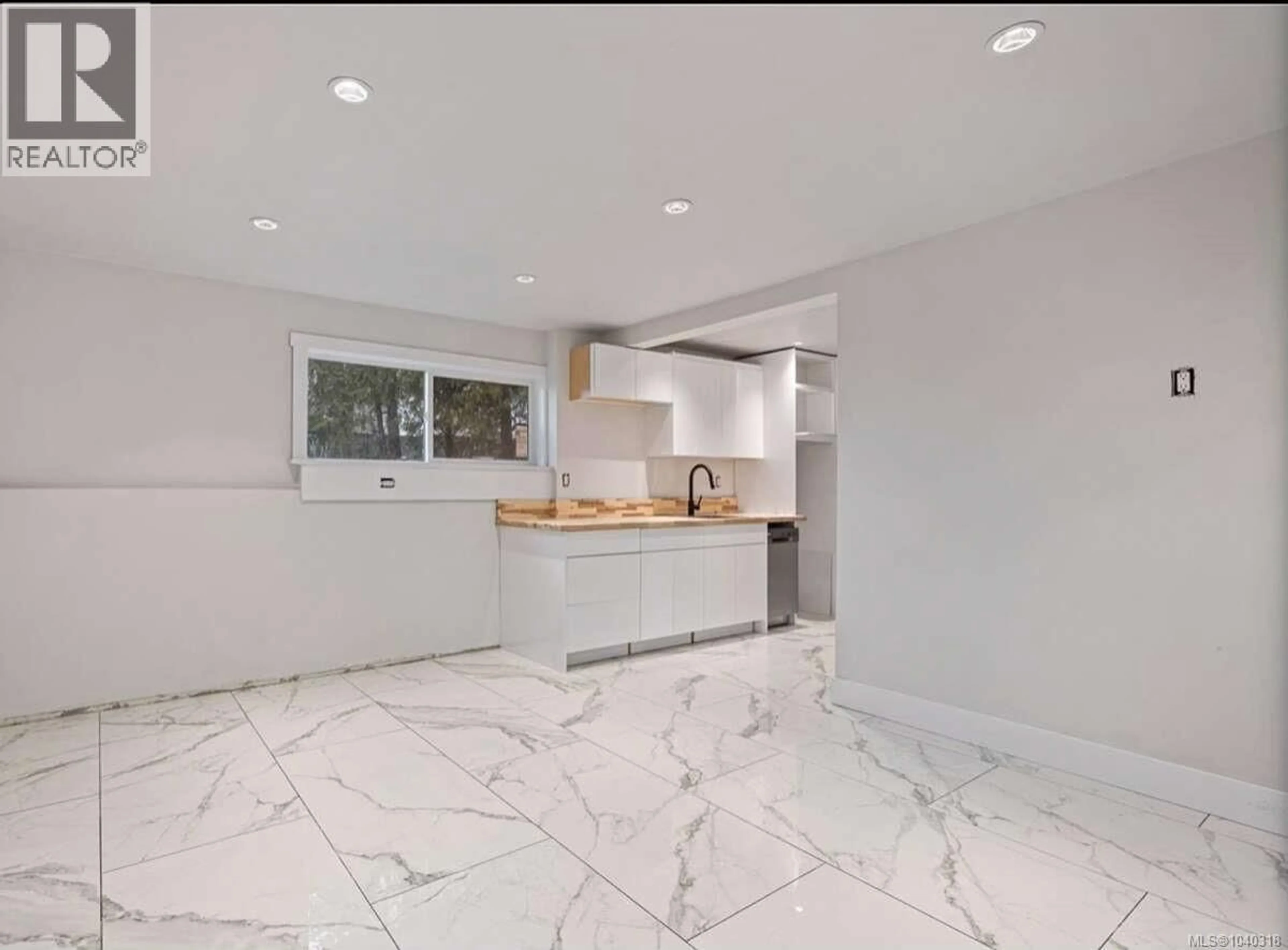 Open concept kitchen, ceramic/tile floor for 981 PRATT ROAD, Hilliers British Columbia V9K1W5