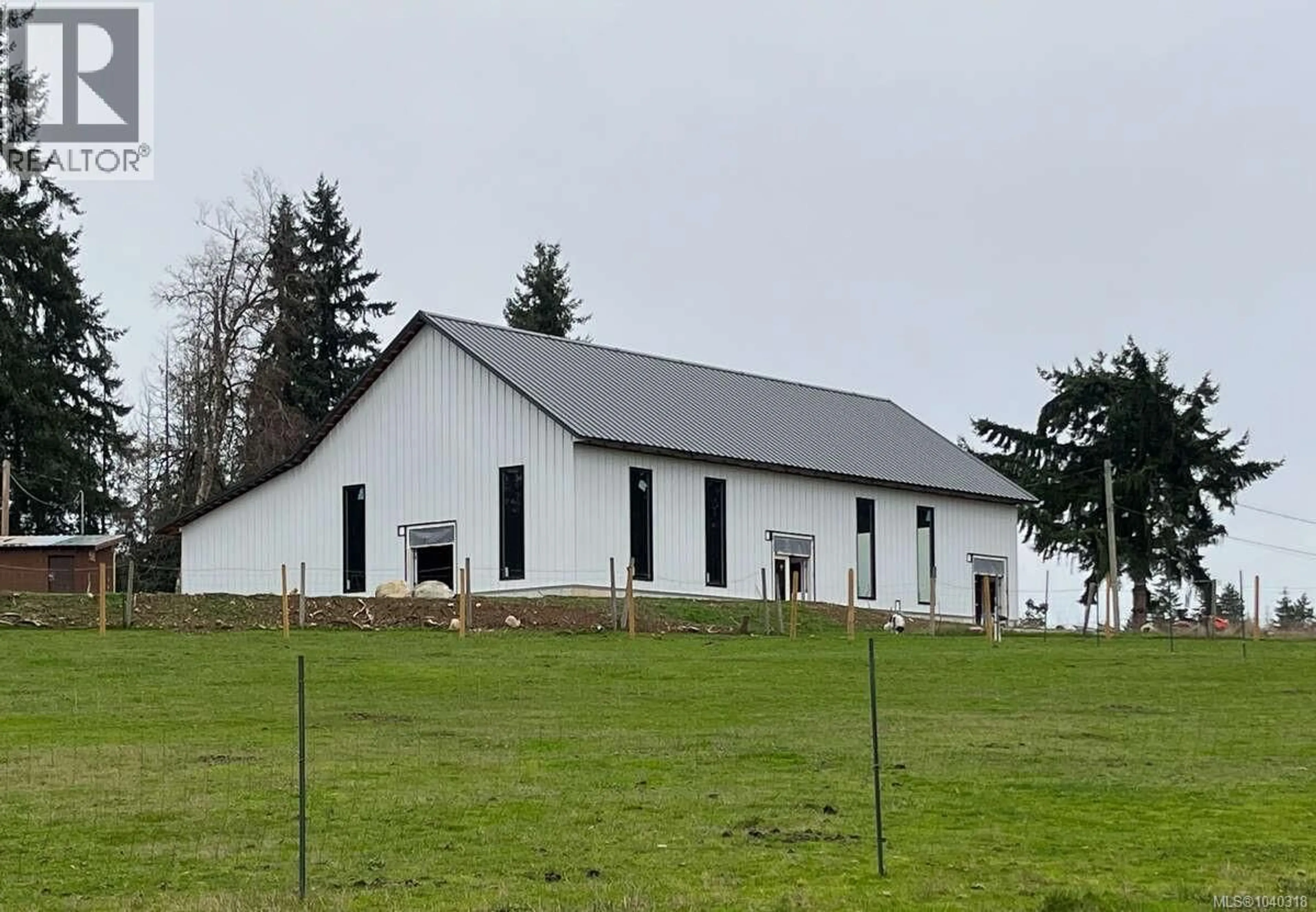 A pic from outside/outdoor area/front of a property/back of a property/a pic from drone, building for 981 PRATT ROAD, Hilliers British Columbia V9K1W5