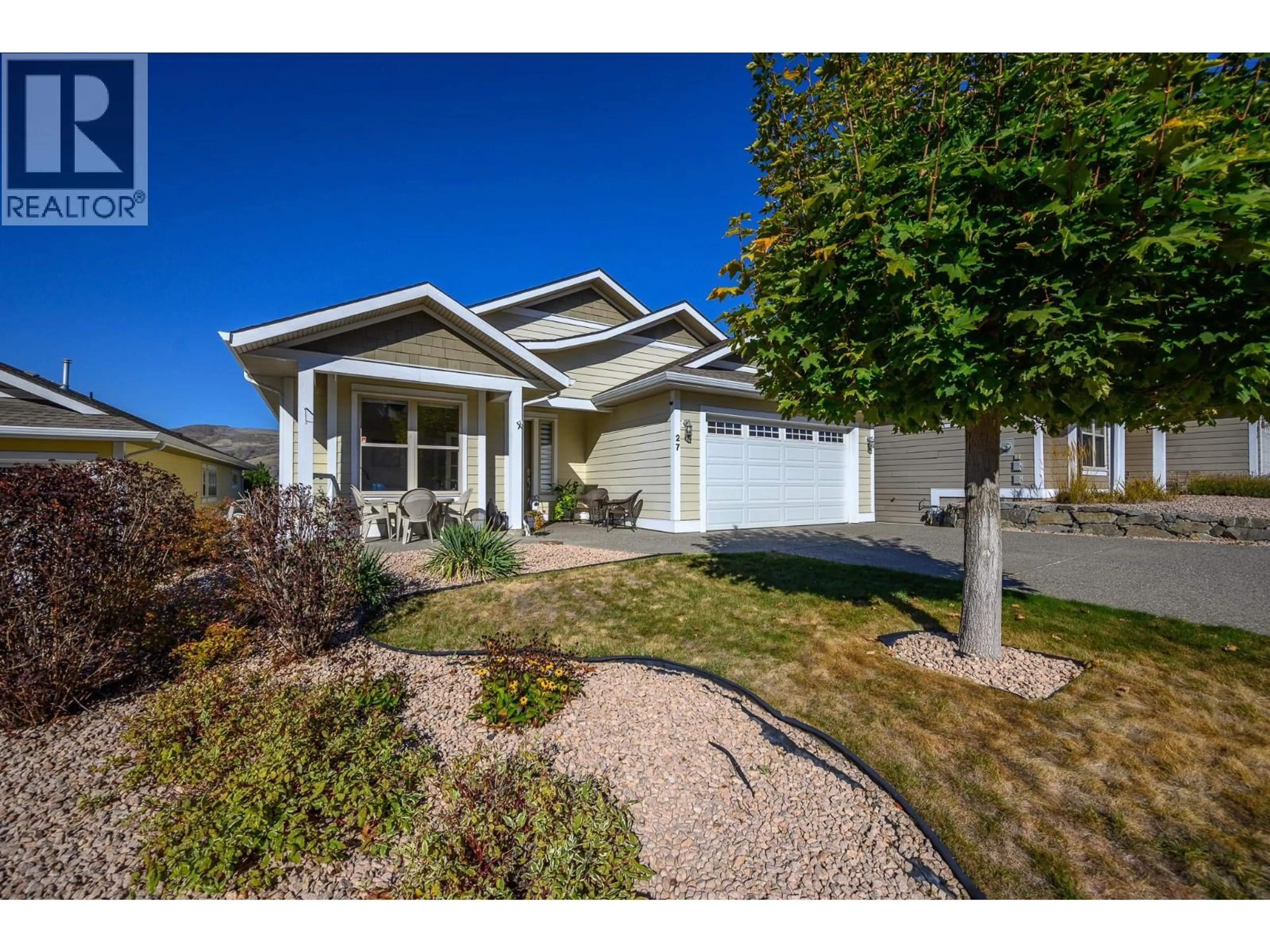 Home with vinyl exterior material, street for 27 - 7760 OKANAGAN LANDING ROAD, Vernon British Columbia V1H1Z4