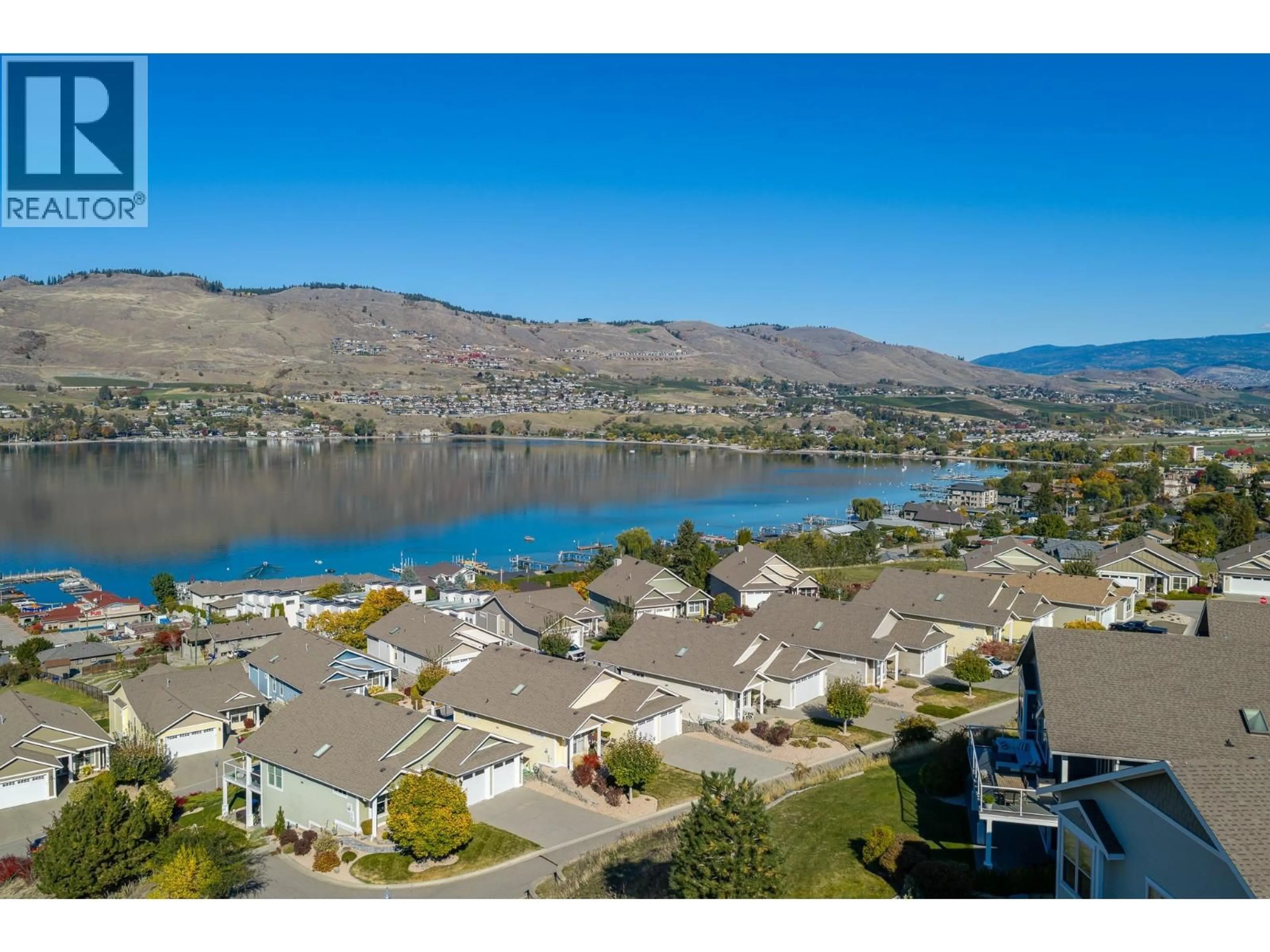 A pic from outside/outdoor area/front of a property/back of a property/a pic from drone, water/lake/river/ocean view for 27 - 7760 OKANAGAN LANDING ROAD, Vernon British Columbia V1H1Z4