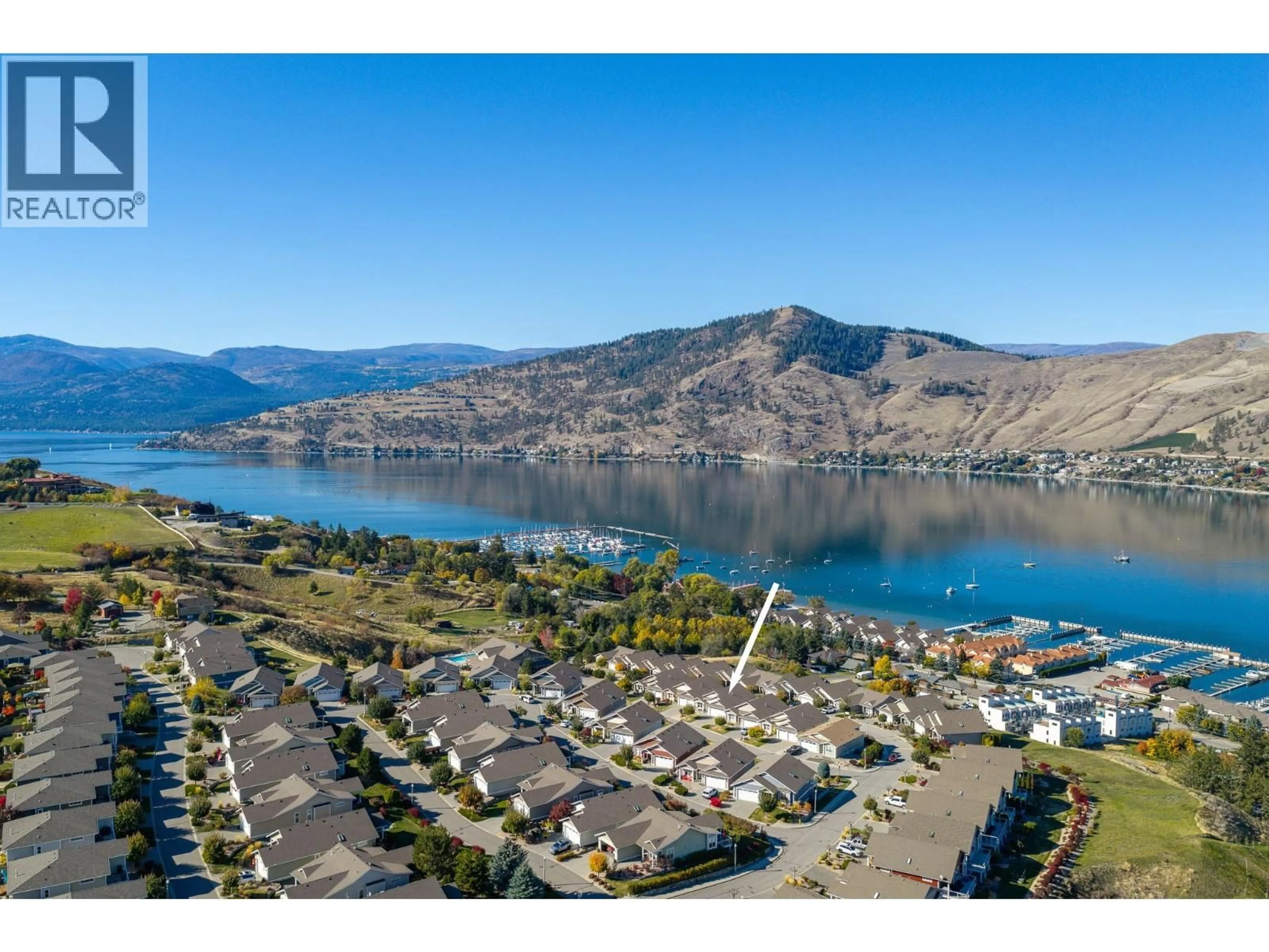 A pic from outside/outdoor area/front of a property/back of a property/a pic from drone, water/lake/river/ocean view for 27 - 7760 OKANAGAN LANDING ROAD, Vernon British Columbia V1H1Z4