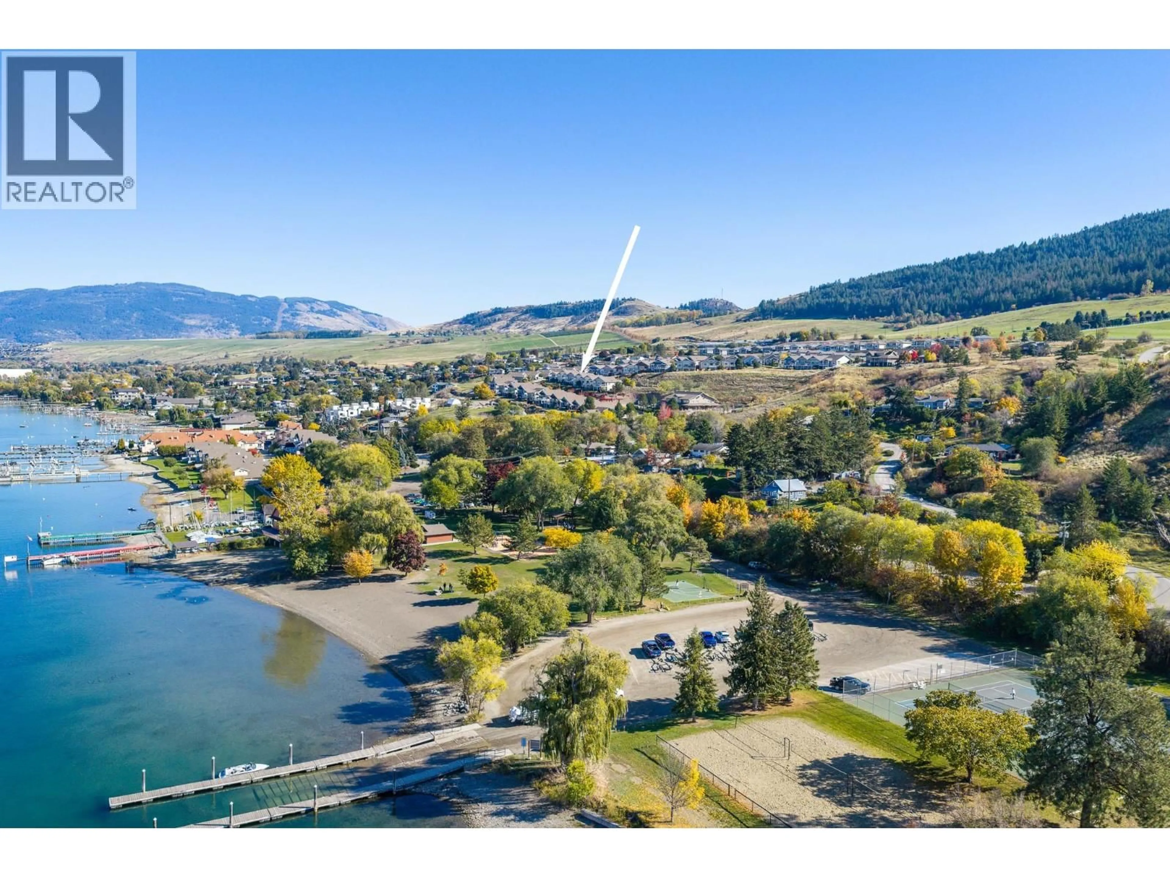 A pic from outside/outdoor area/front of a property/back of a property/a pic from drone, water/lake/river/ocean view for 27 - 7760 OKANAGAN LANDING ROAD, Vernon British Columbia V1H1Z4