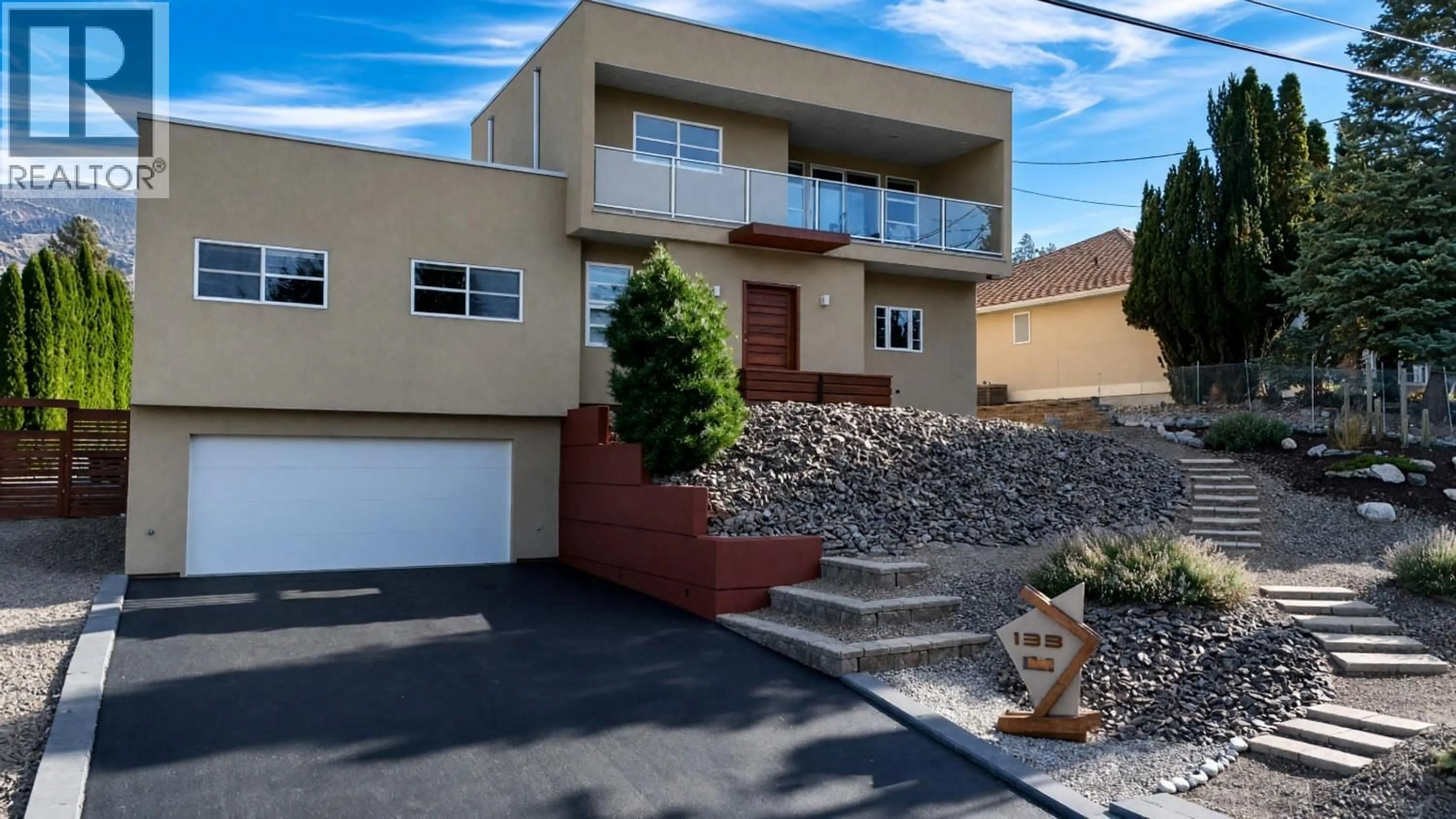 Home with vinyl exterior material, street for 133 DEVON DRIVE, Penticton British Columbia V0H1R5