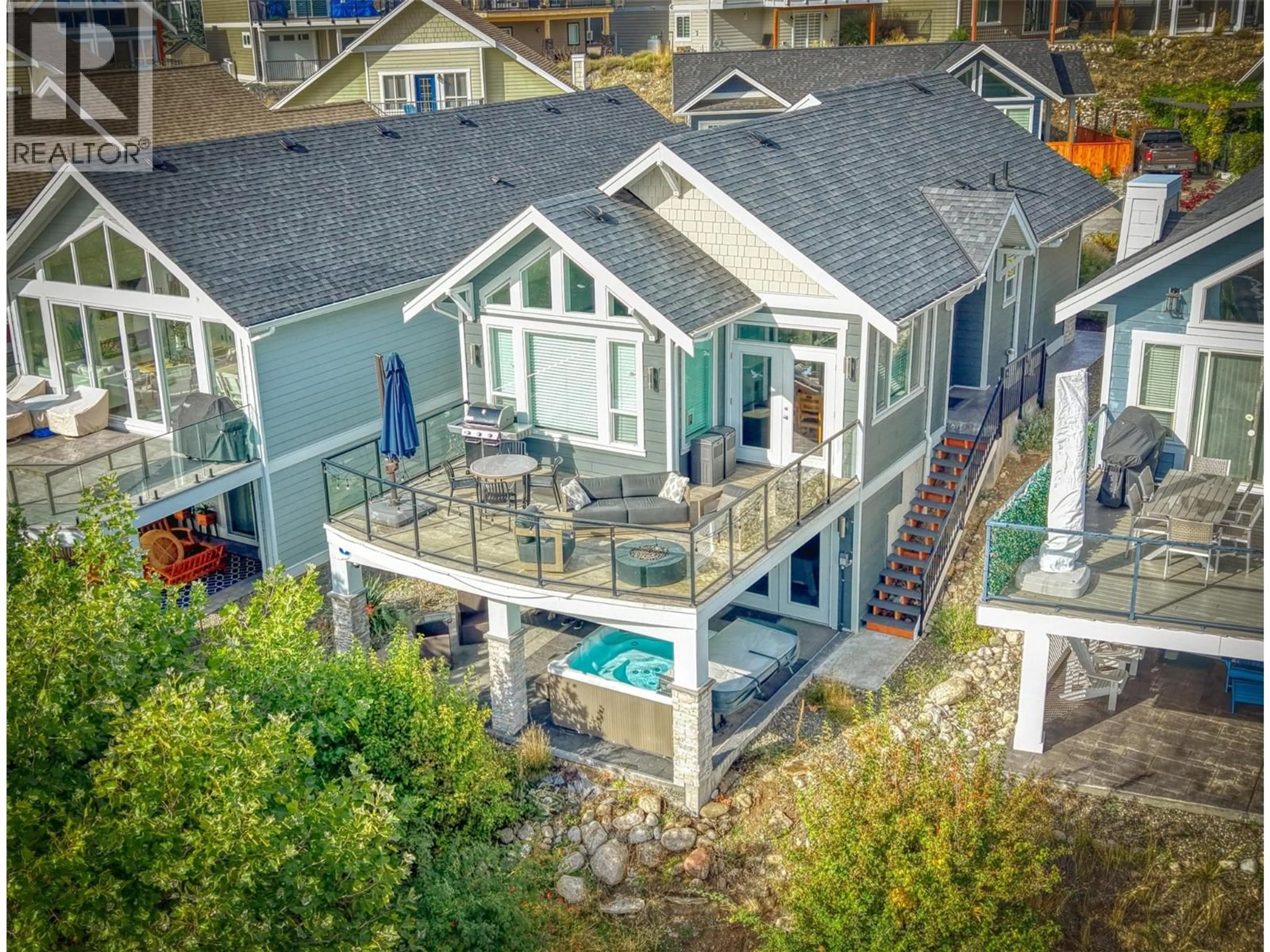 A pic from outside/outdoor area/front of a property/back of a property/a pic from drone, water/lake/river/ocean view for 481 - 7018 TERAZONA DRIVE, Kelowna British Columbia V1Z3R8