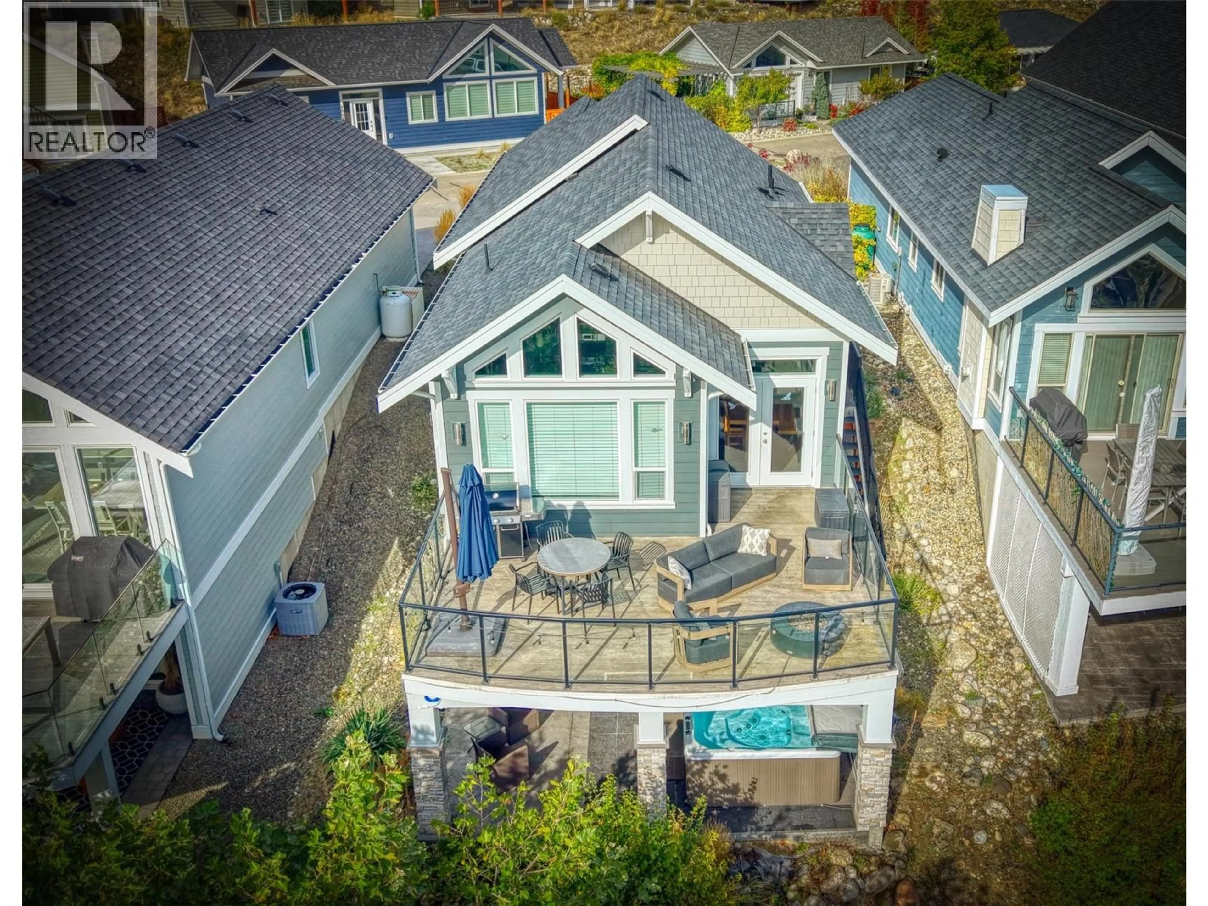 A pic from outside/outdoor area/front of a property/back of a property/a pic from drone, water/lake/river/ocean view for 481 - 7018 TERAZONA DRIVE, Kelowna British Columbia V1Z3R8