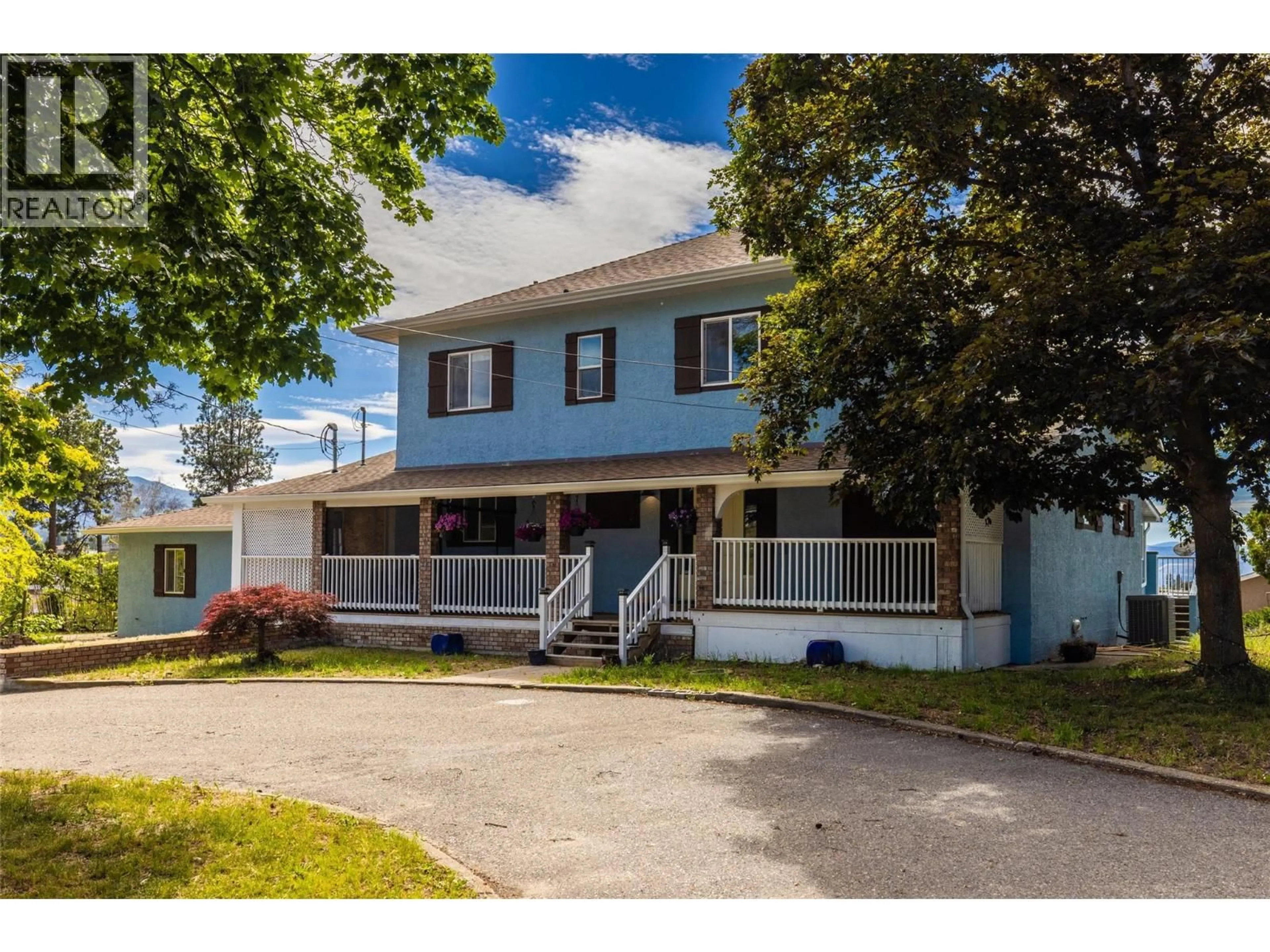 Home with vinyl exterior material, street for 3299 MCCULLOCH ROAD, Kelowna British Columbia V1W4G5