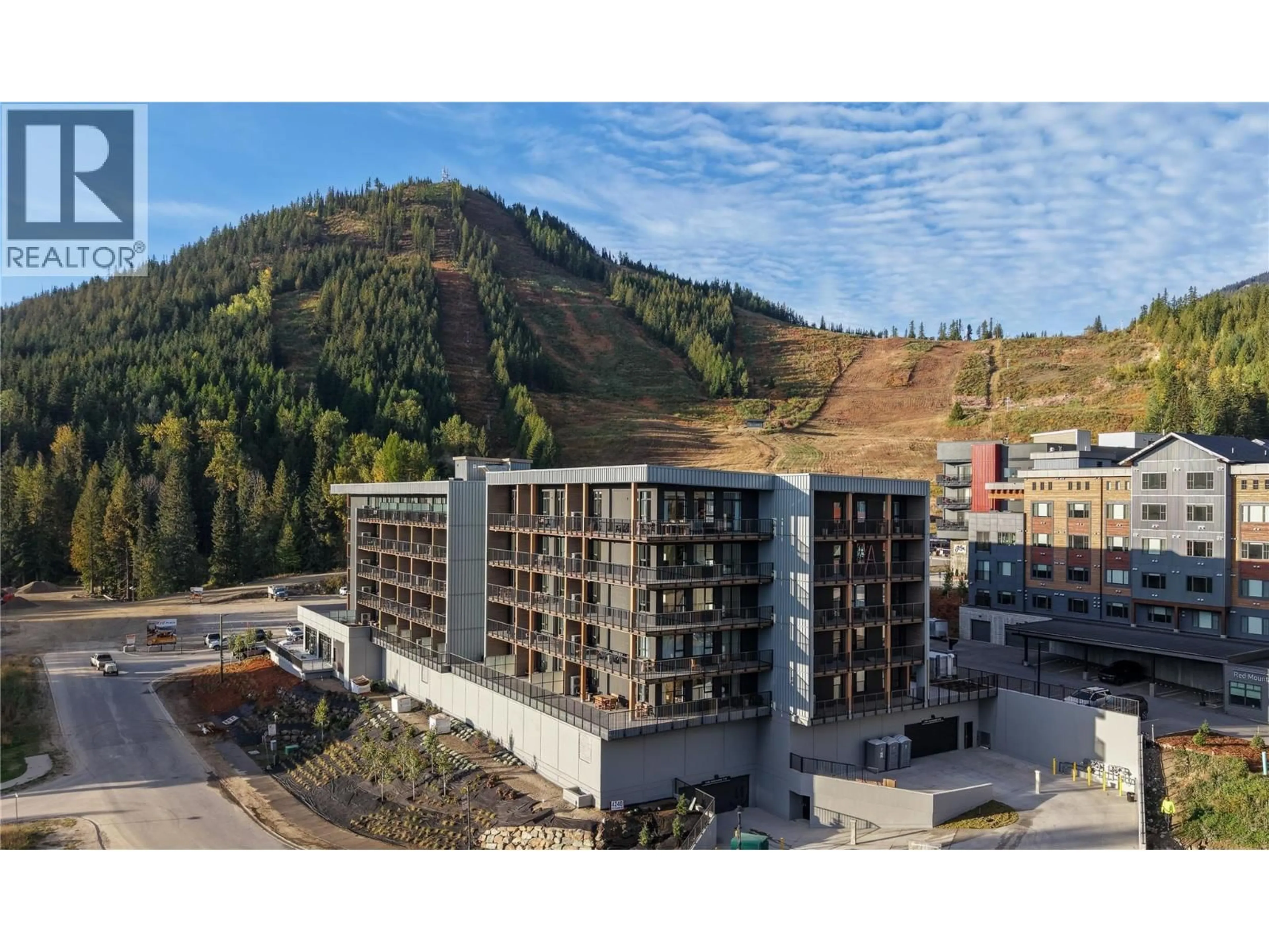 A pic from outside/outdoor area/front of a property/back of a property/a pic from drone, mountain view for 216 - 4240 RED MOUNTAIN ROAD, Rossland British Columbia V0G1Y0