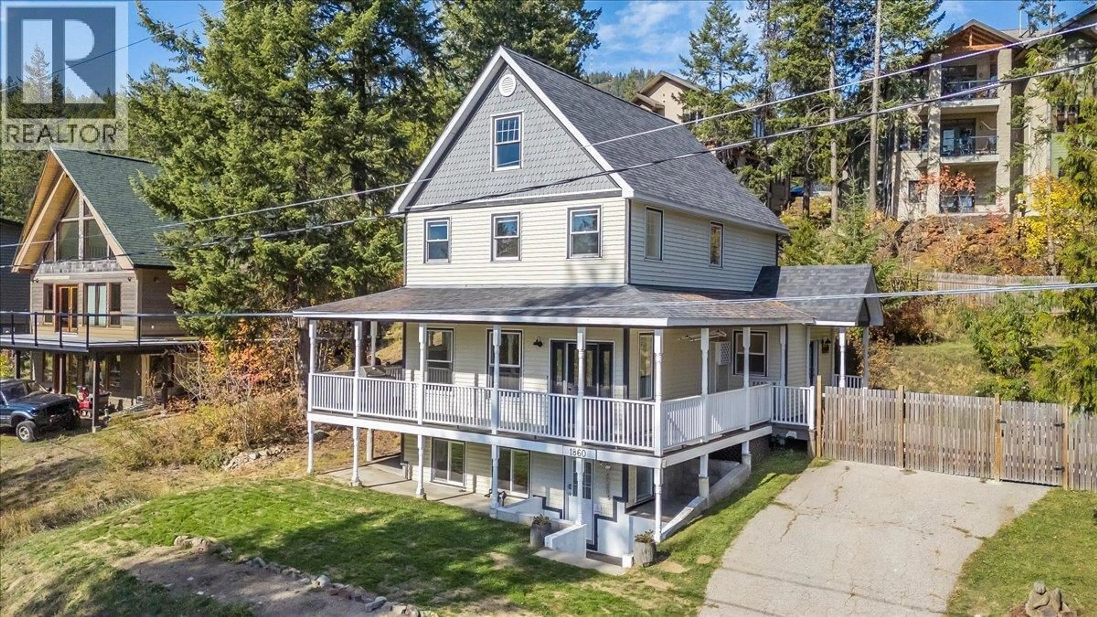 A pic from outside/outdoor area/front of a property/back of a property/a pic from drone, street for 1860 PLANER CRESCENT, Rossland British Columbia V0G1Y0