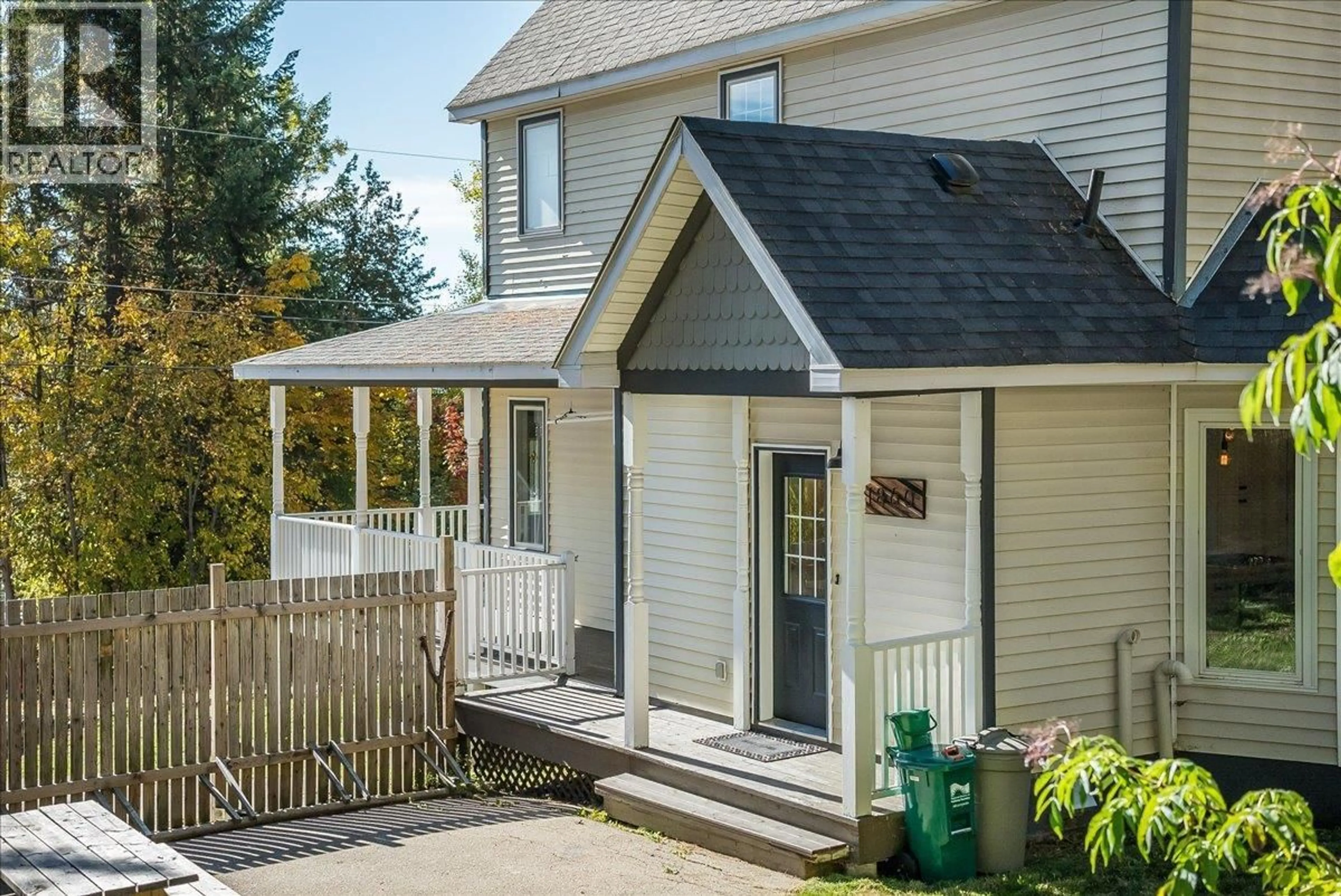 Home with vinyl exterior material, street for 1860 PLANER CRESCENT, Rossland British Columbia V0G1Y0