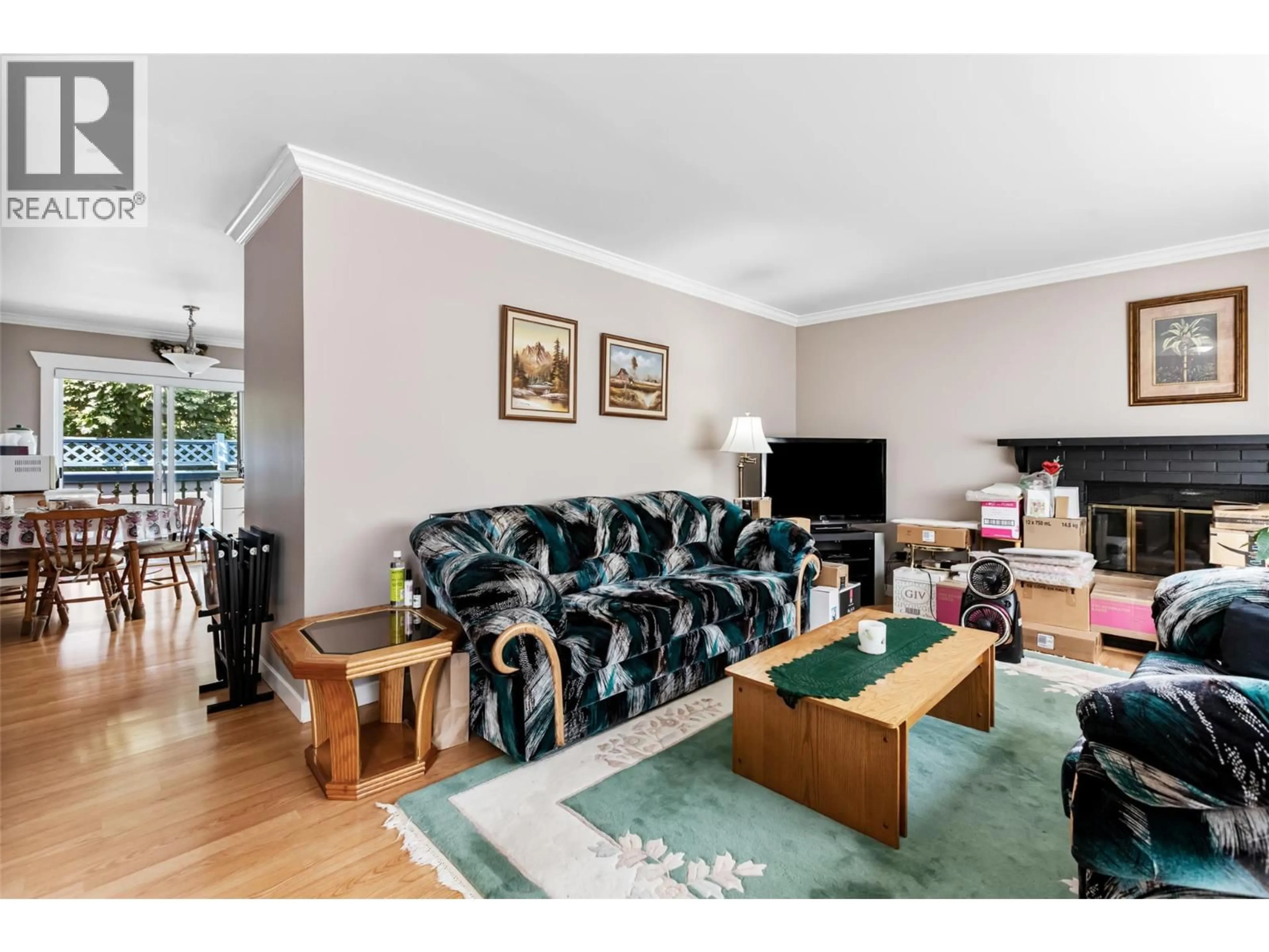 Living room with furniture, wood/laminate floor for 5911 EHLERS ROAD, Peachland British Columbia V0H1X0