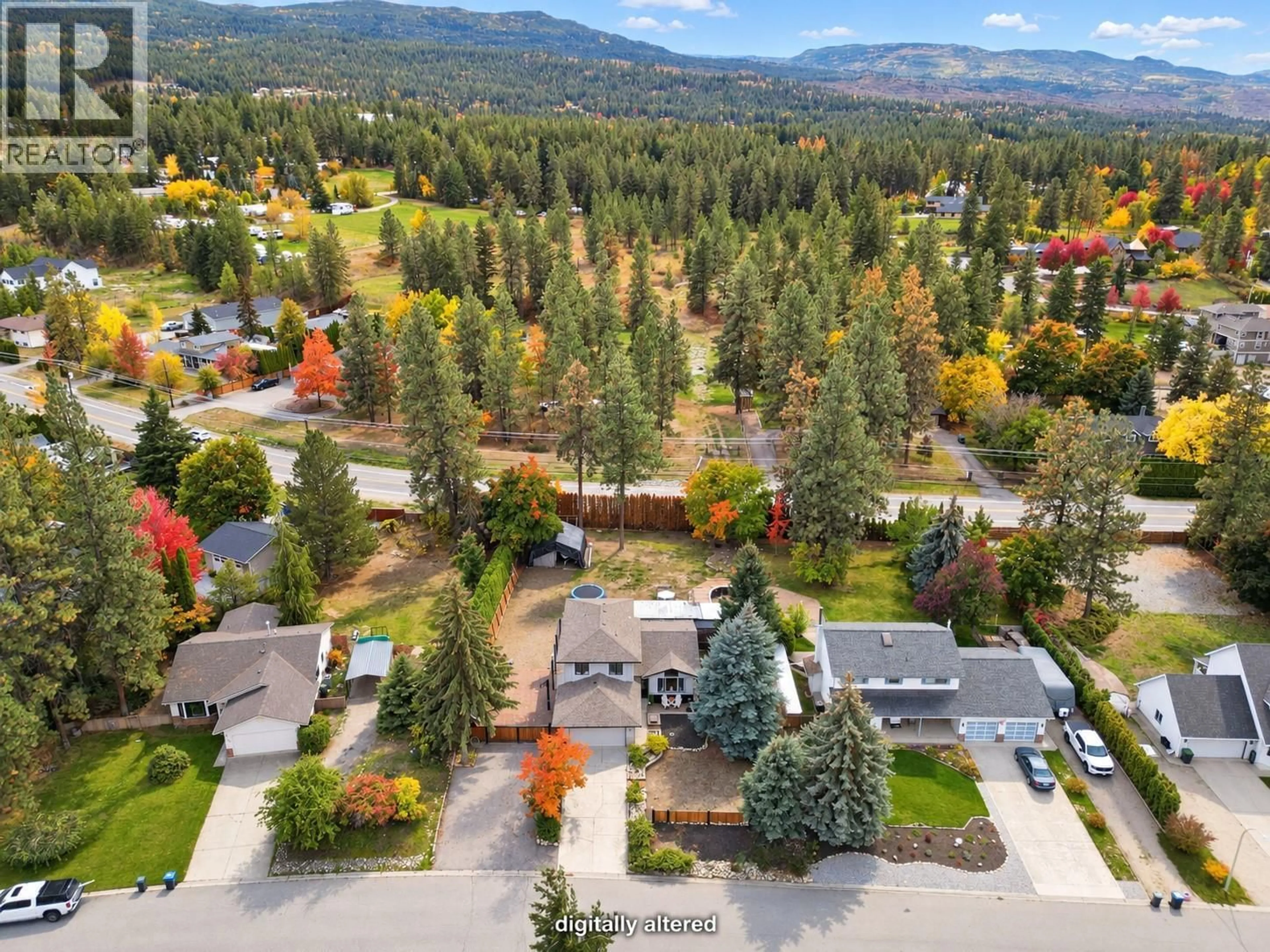 A pic from outside/outdoor area/front of a property/back of a property/a pic from drone, mountain view for 3745 KIMATOUCHE ROAD, Kelowna British Columbia V1Y7R2