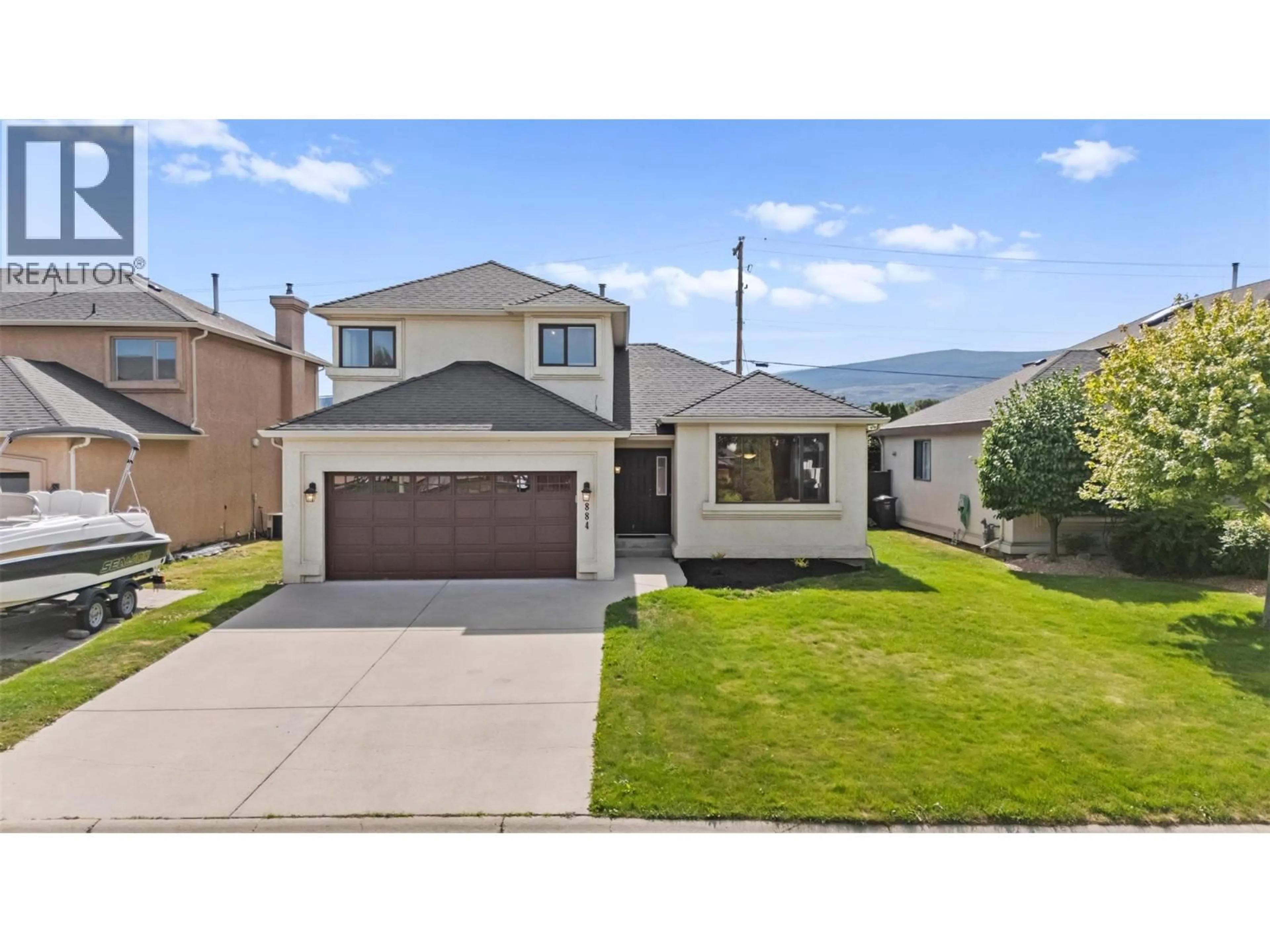 Home with vinyl exterior material, mountain view for 884 MISSION SPRINGS CRESCENT, Kelowna British Columbia V1W3L9