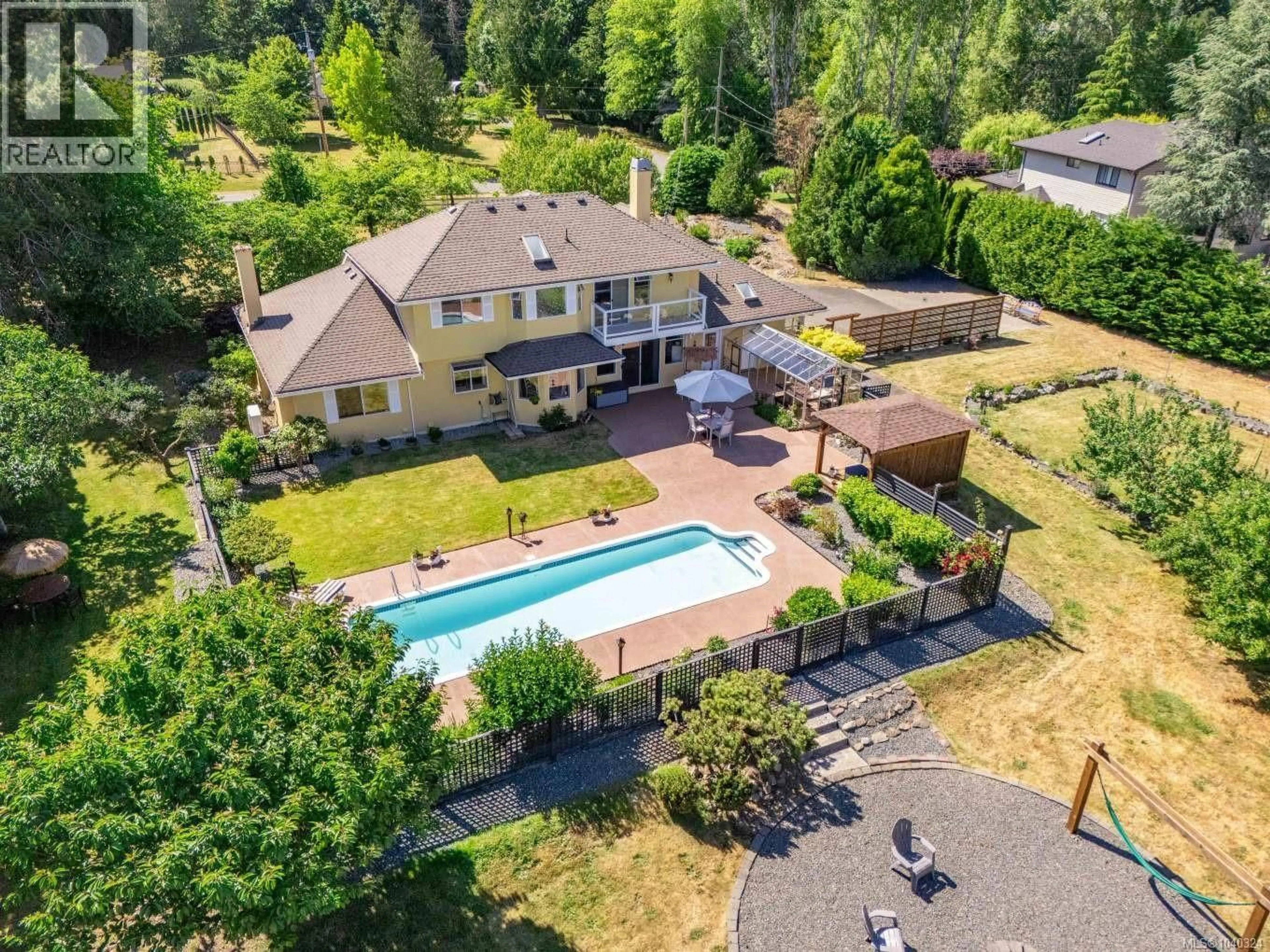 A pic from outside/outdoor area/front of a property/back of a property/a pic from drone, mountain view for 11109 TANAGER ROAD, North Saanich British Columbia V8L5N5