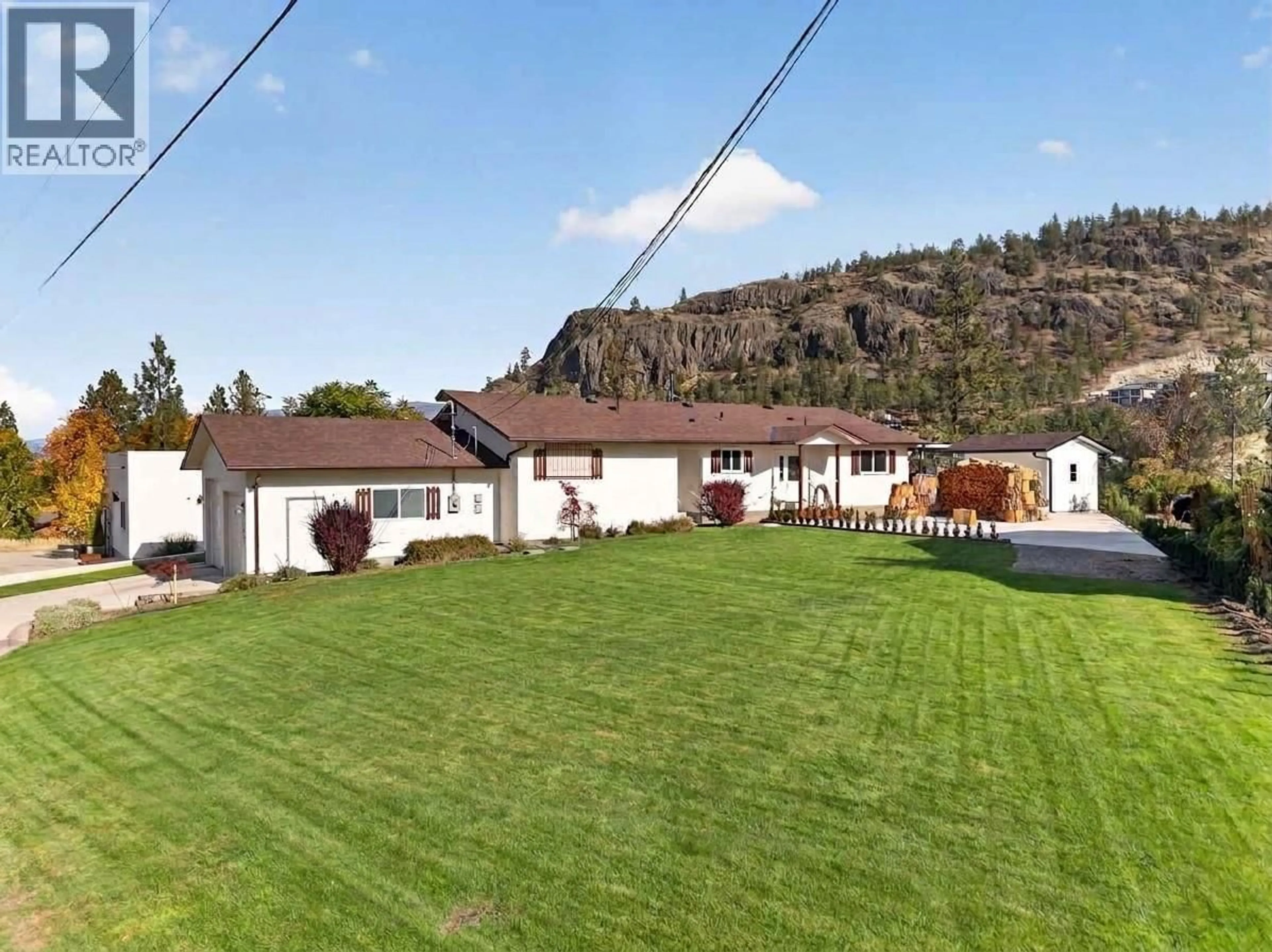 A pic from outside/outdoor area/front of a property/back of a property/a pic from drone, mountain view for 10836 DUNHAM CRESCENT, Summerland British Columbia V0H1Z2