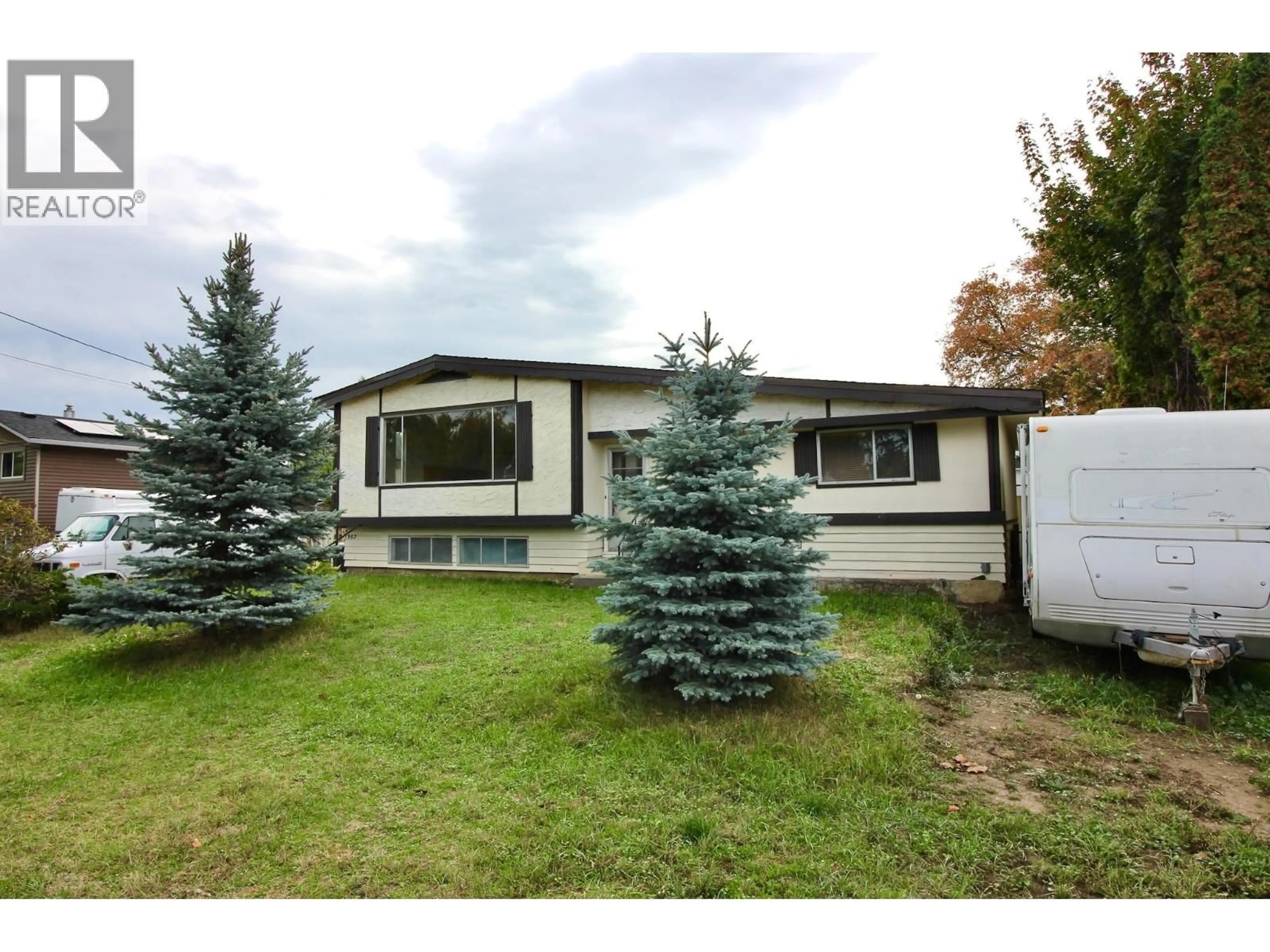 Home with vinyl exterior material, street for 1382 MCBRIDE ROAD ROAD, Kelowna British Columbia V1Y4A6