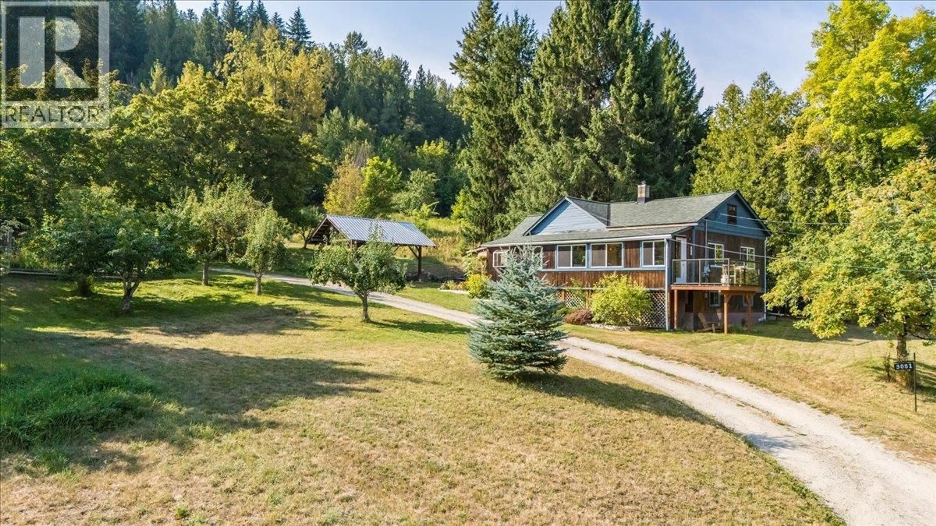 A pic from outside/outdoor area/front of a property/back of a property/a pic from drone, forest/trees view for 3051 FOFONOW ROAD, Nelson British Columbia V1L6Y5