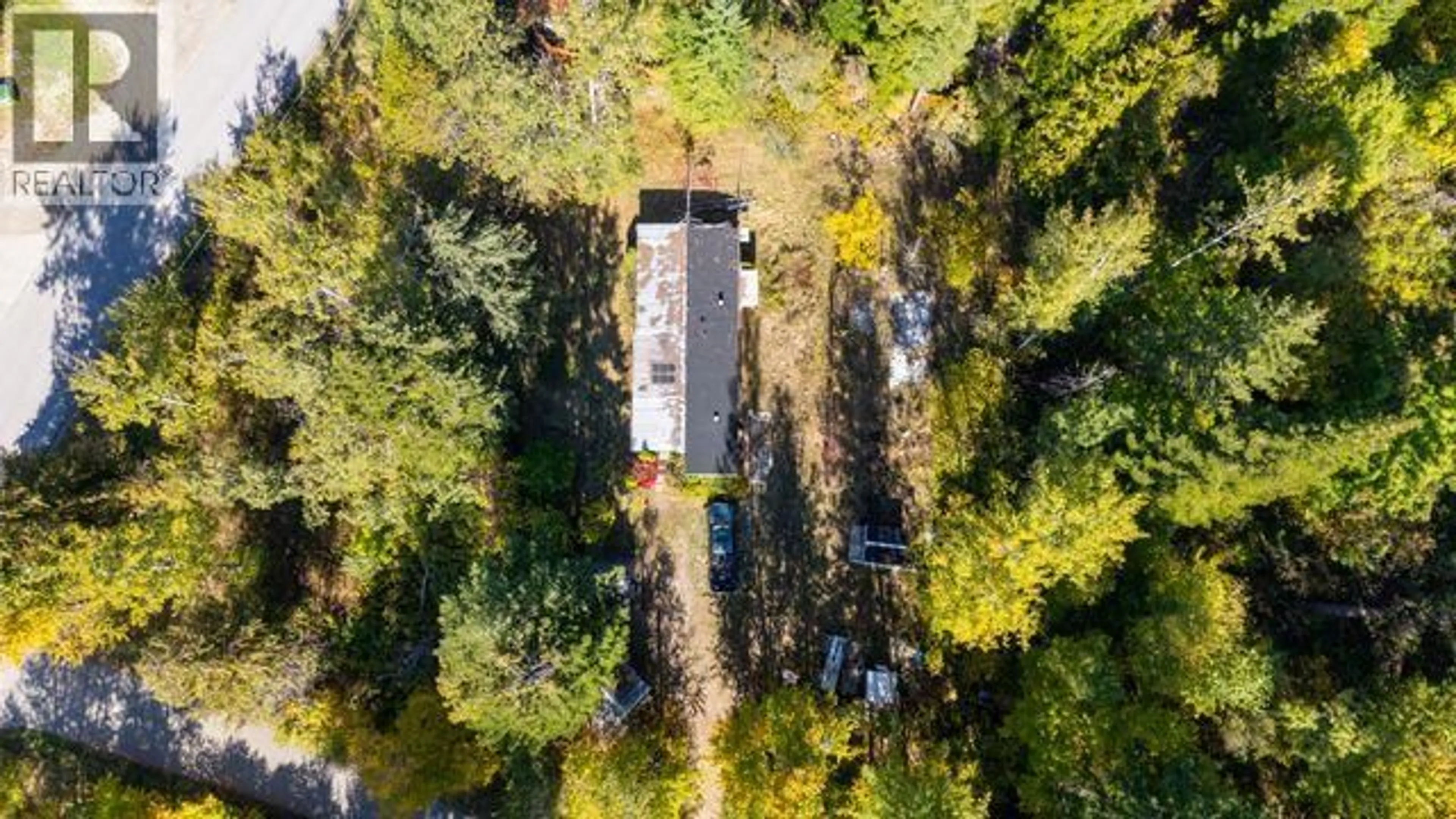A pic from outside/outdoor area/front of a property/back of a property/a pic from drone, forest/trees view for 2701 LEECREST ROAD, Nelson British Columbia V1L6L1