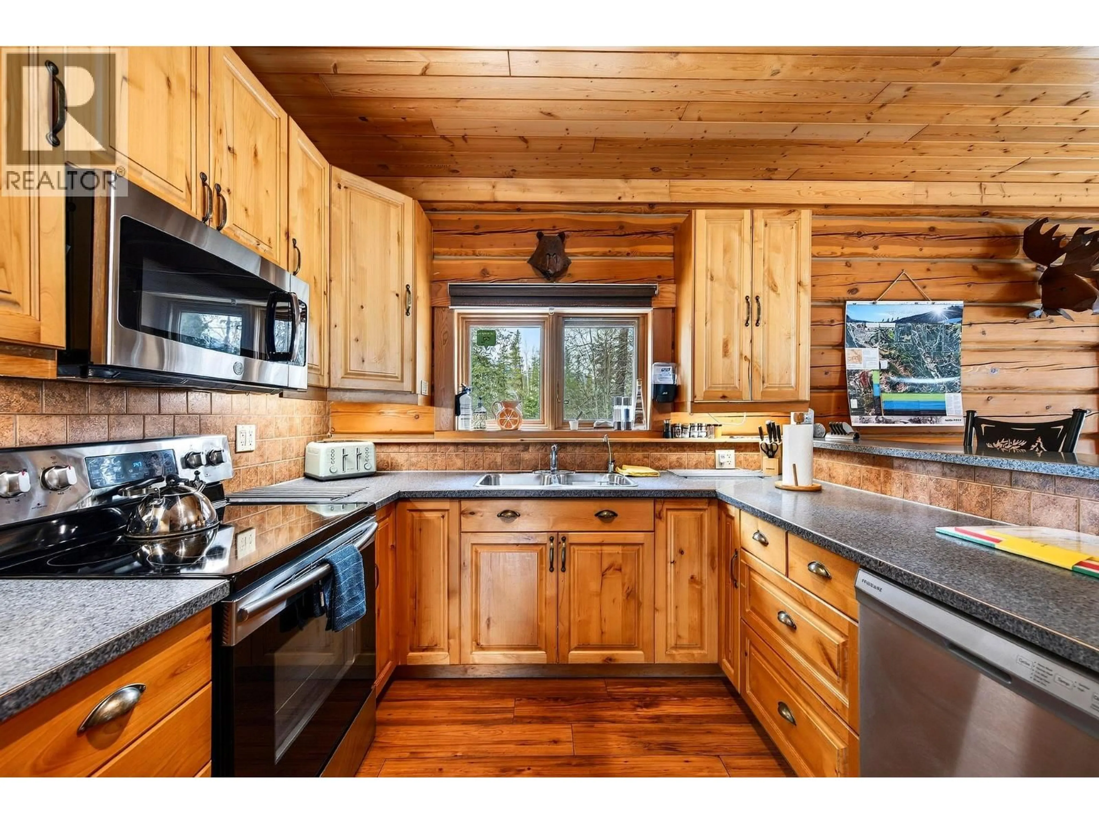 Rustic kitchen, wood/laminate floor for B-1732 OBERG JOHNSON ROAD, Golden British Columbia V0A1H1