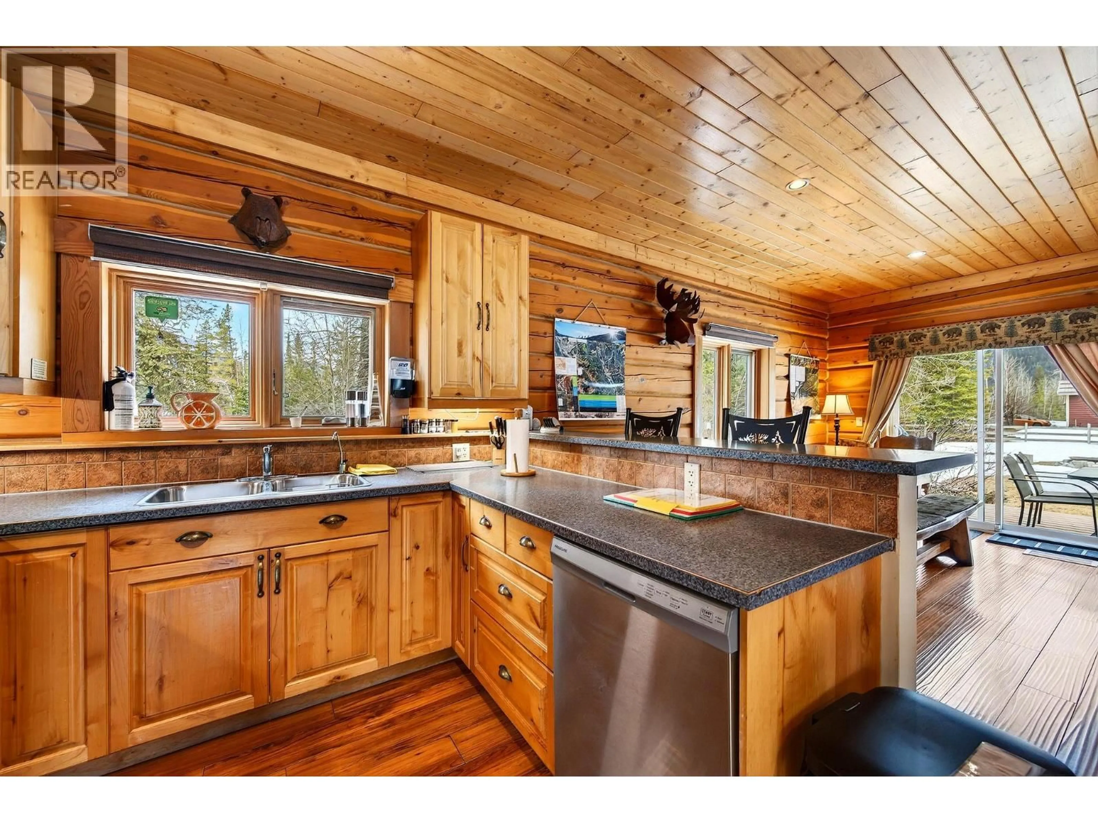 Rustic kitchen, wood/laminate floor for B-1732 OBERG JOHNSON ROAD, Golden British Columbia V0A1H1