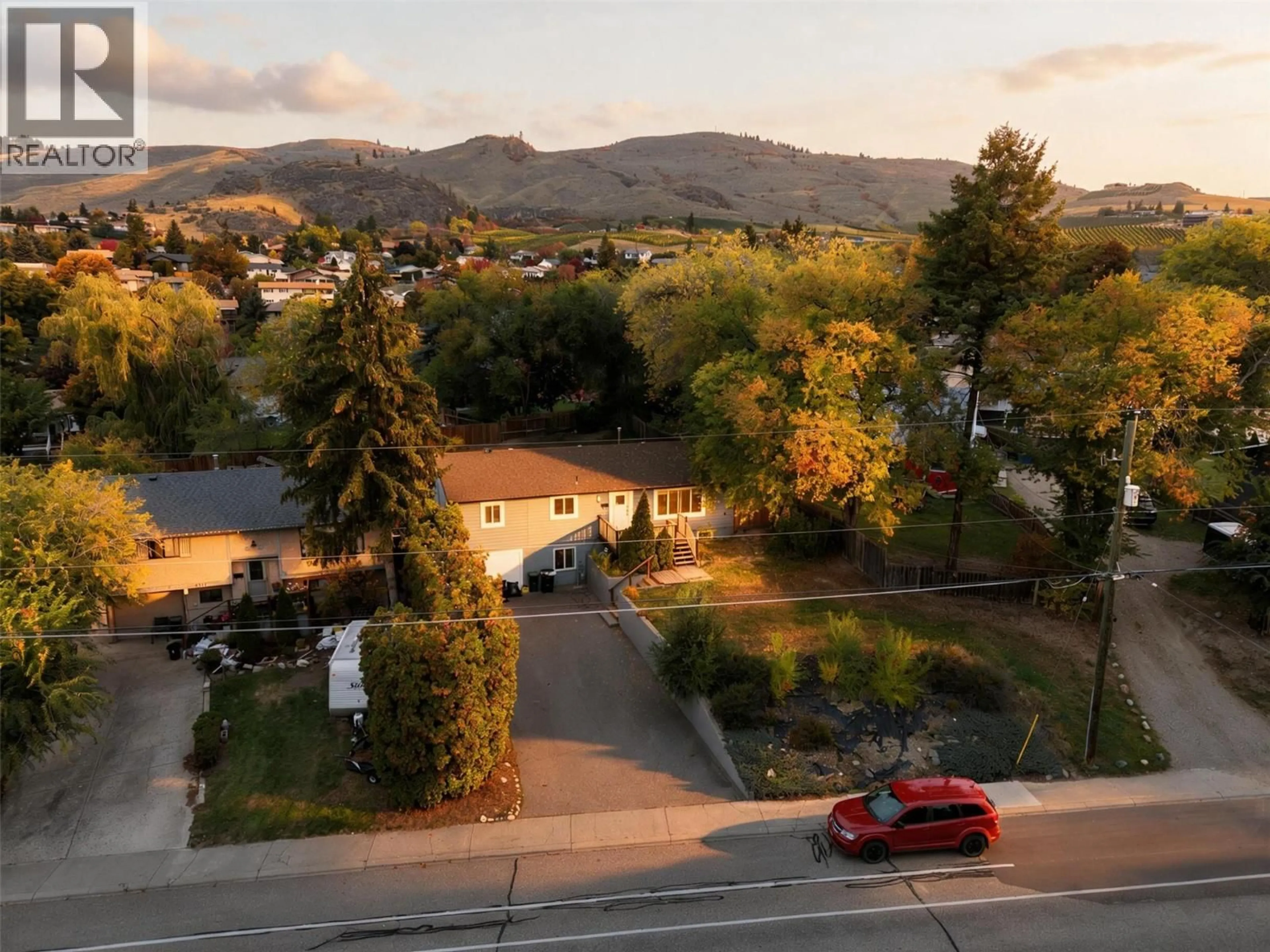 A pic from outside/outdoor area/front of a property/back of a property/a pic from drone, mountain view for 5113 27 AVENUE, Vernon British Columbia V1T6L2