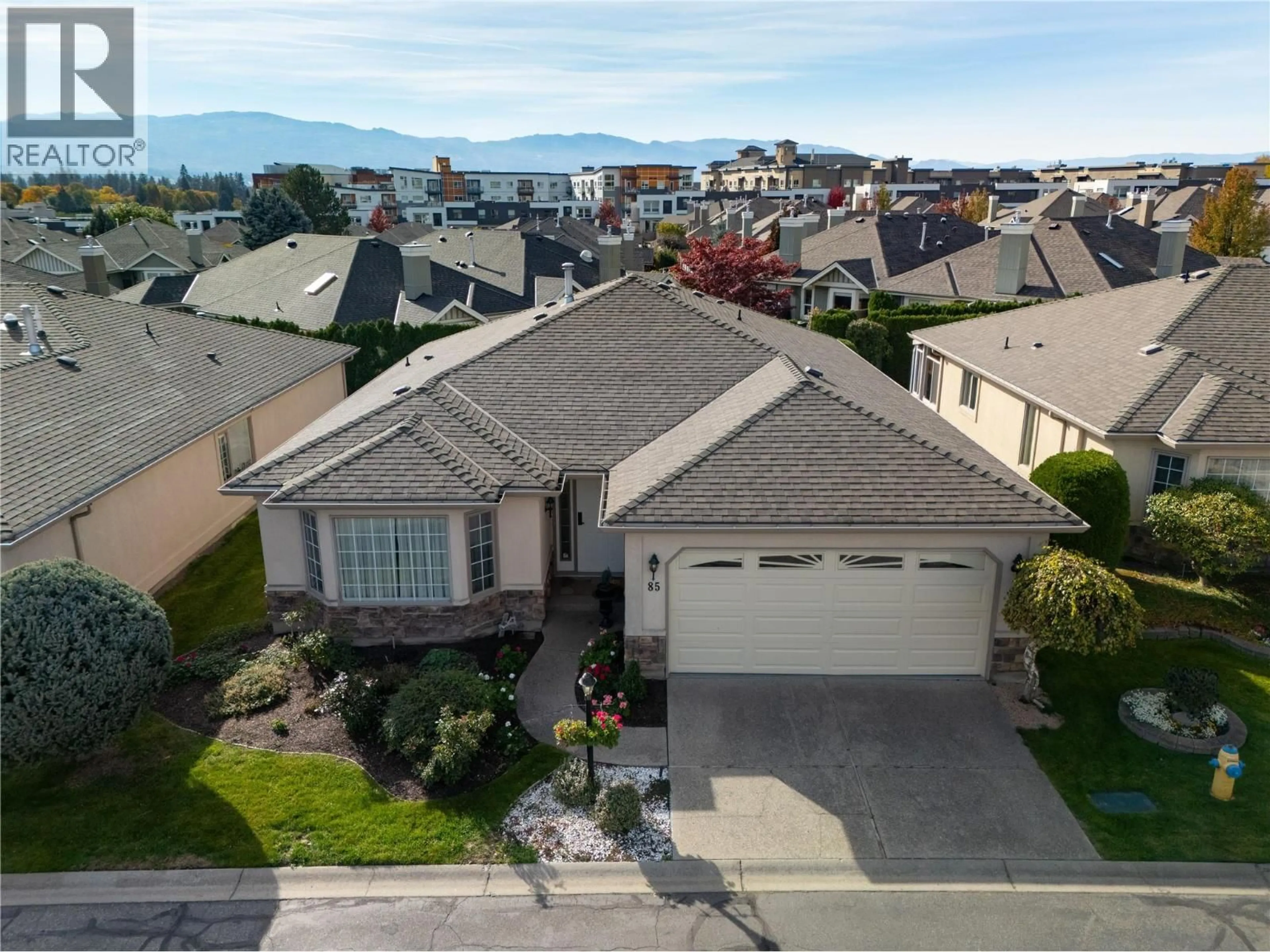 A pic from outside/outdoor area/front of a property/back of a property/a pic from drone, street for 85 - 595 YATES ROAD, Kelowna British Columbia V1V1P8
