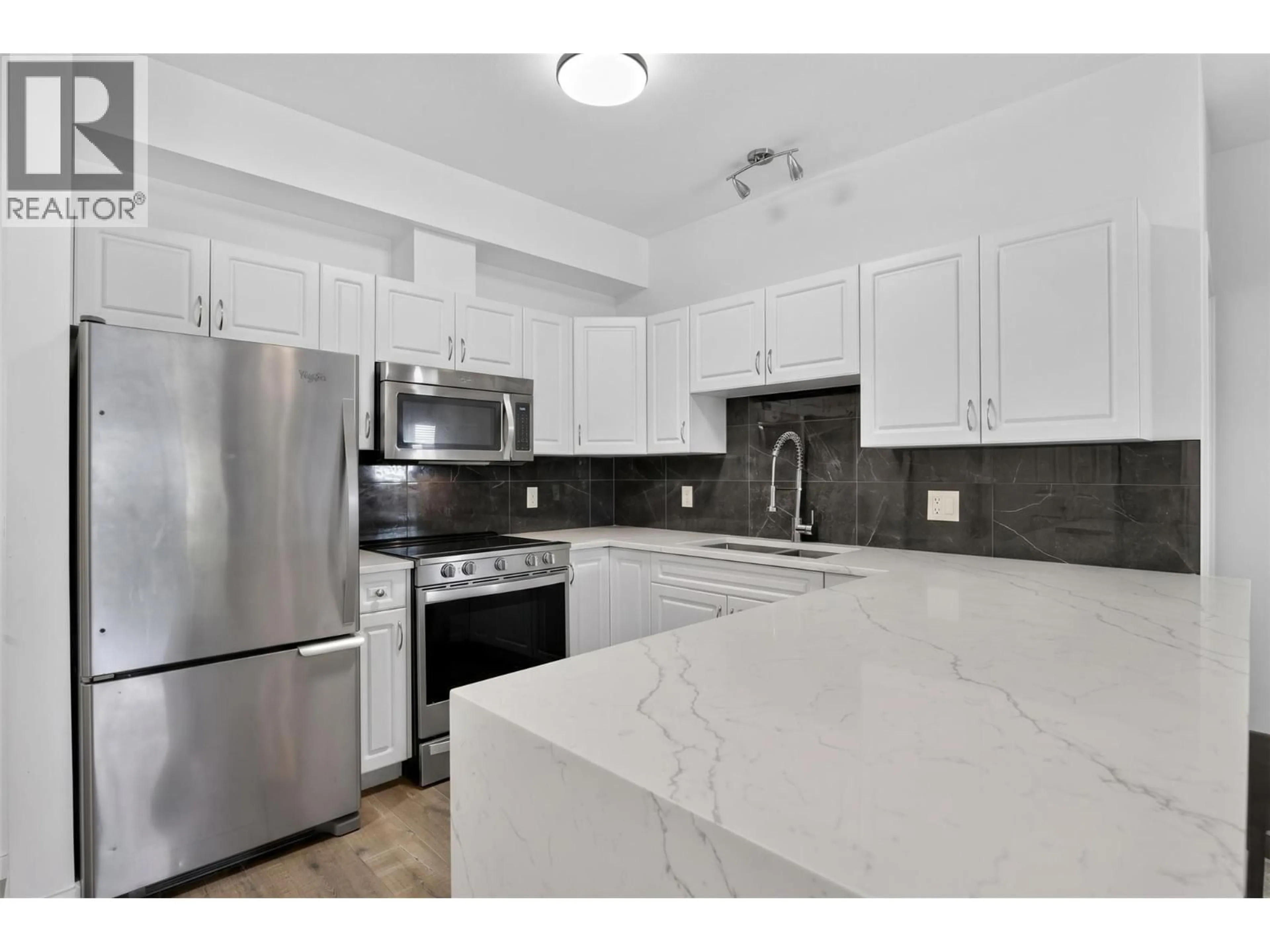 Standard kitchen, ceramic/tile floor for 110 - 770 RUTLAND ROAD, Kelowna British Columbia V1X3B7
