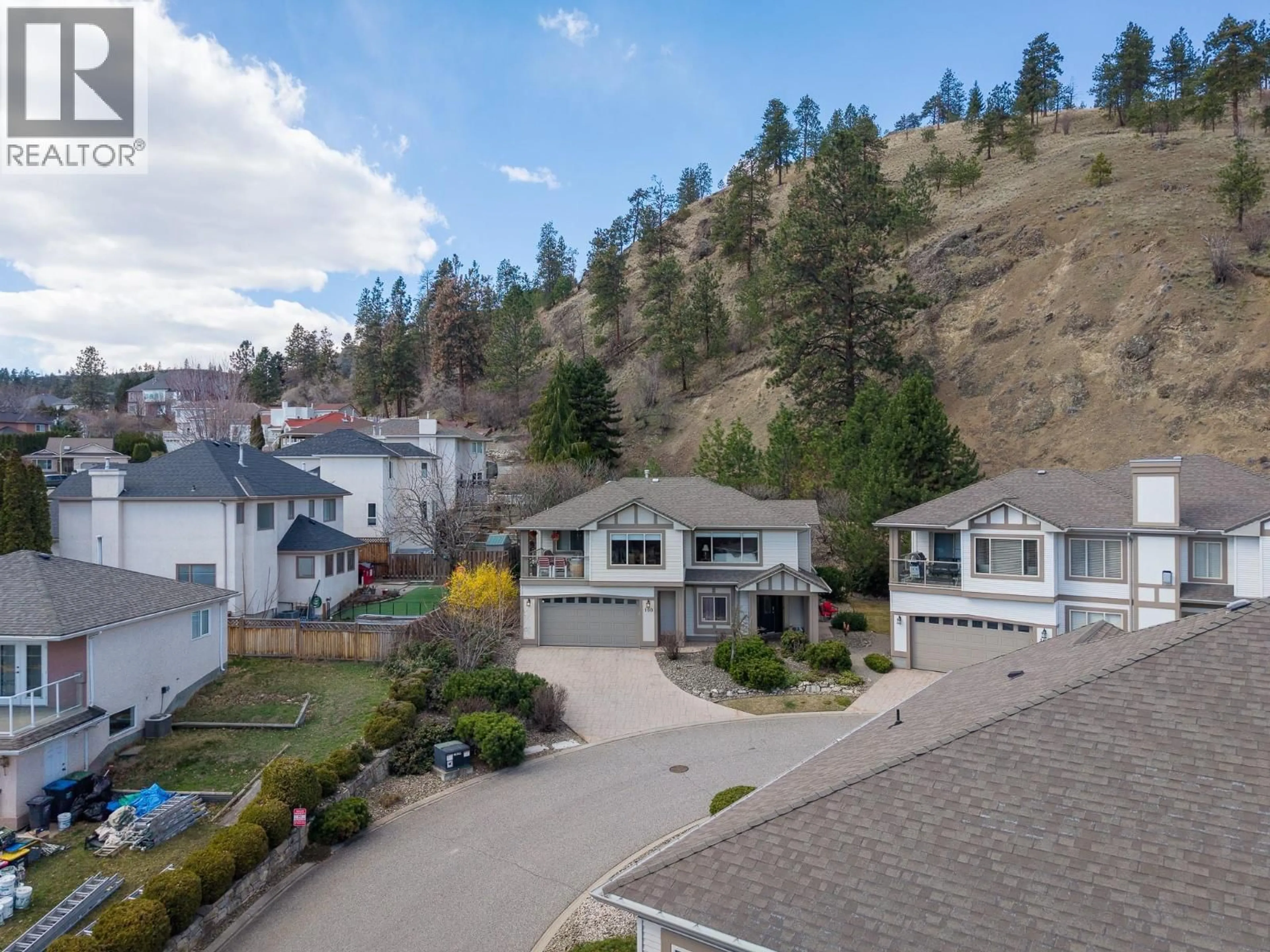 A pic from outside/outdoor area/front of a property/back of a property/a pic from drone, mountain view for 100 - 550 GLENMEADOWS ROAD, Kelowna British Columbia V1V1X3