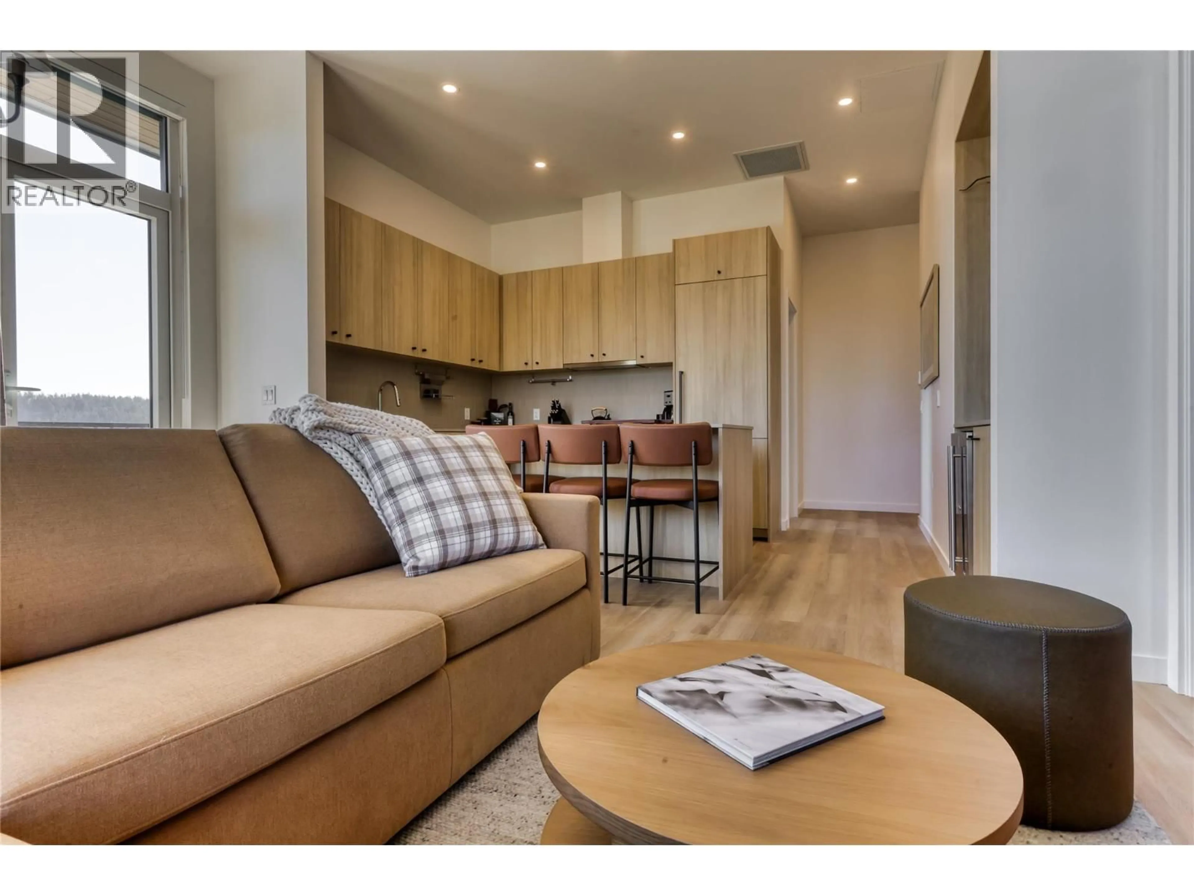 Living room with furniture, wood/laminate floor for 608 - 4240 RED MOUNTAIN ROAD, Rossland British Columbia V0G1Y0