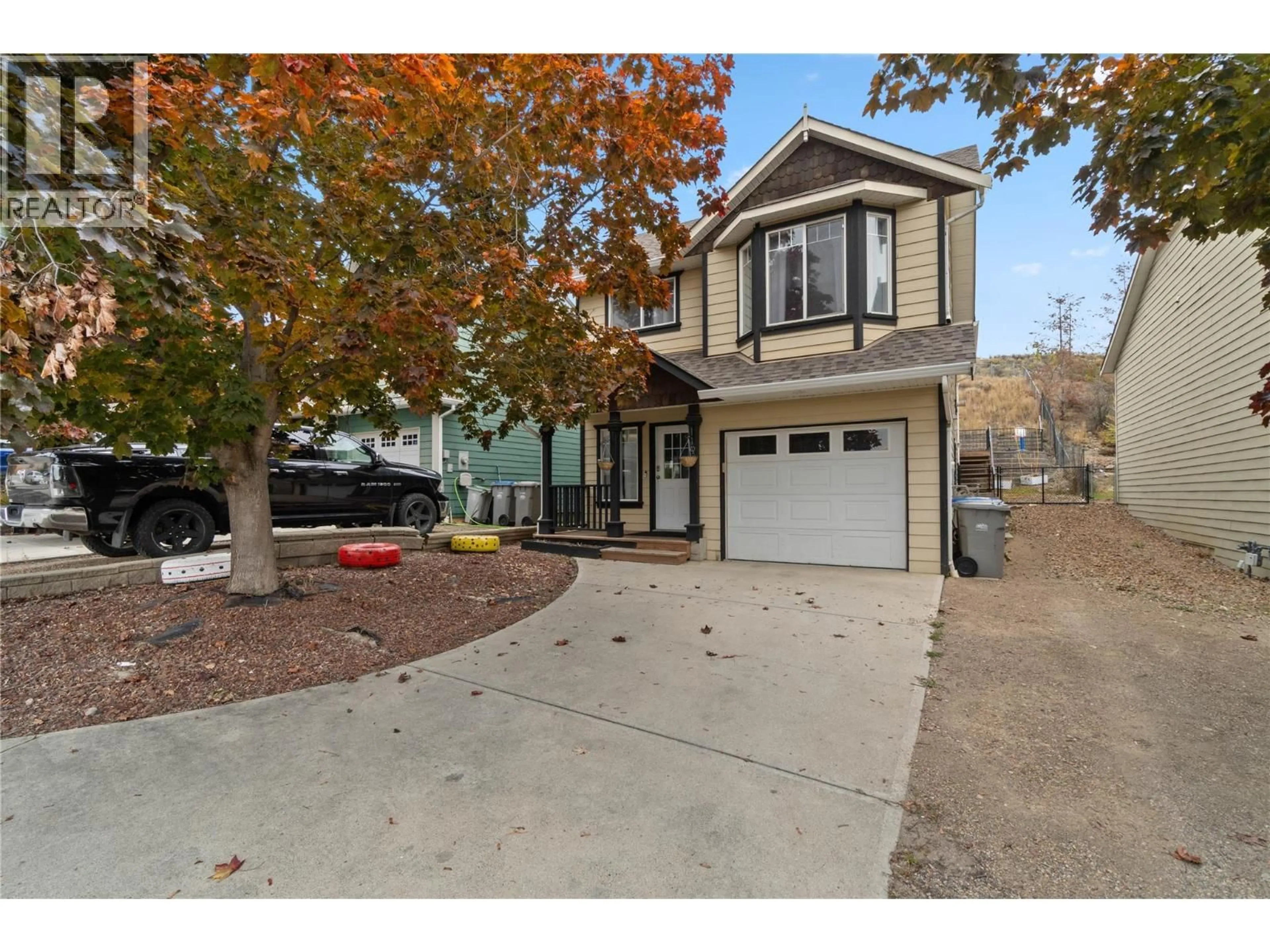 Home with vinyl exterior material, street for 1198 RAVEN DRIVE, Kamloops British Columbia V2B8P3