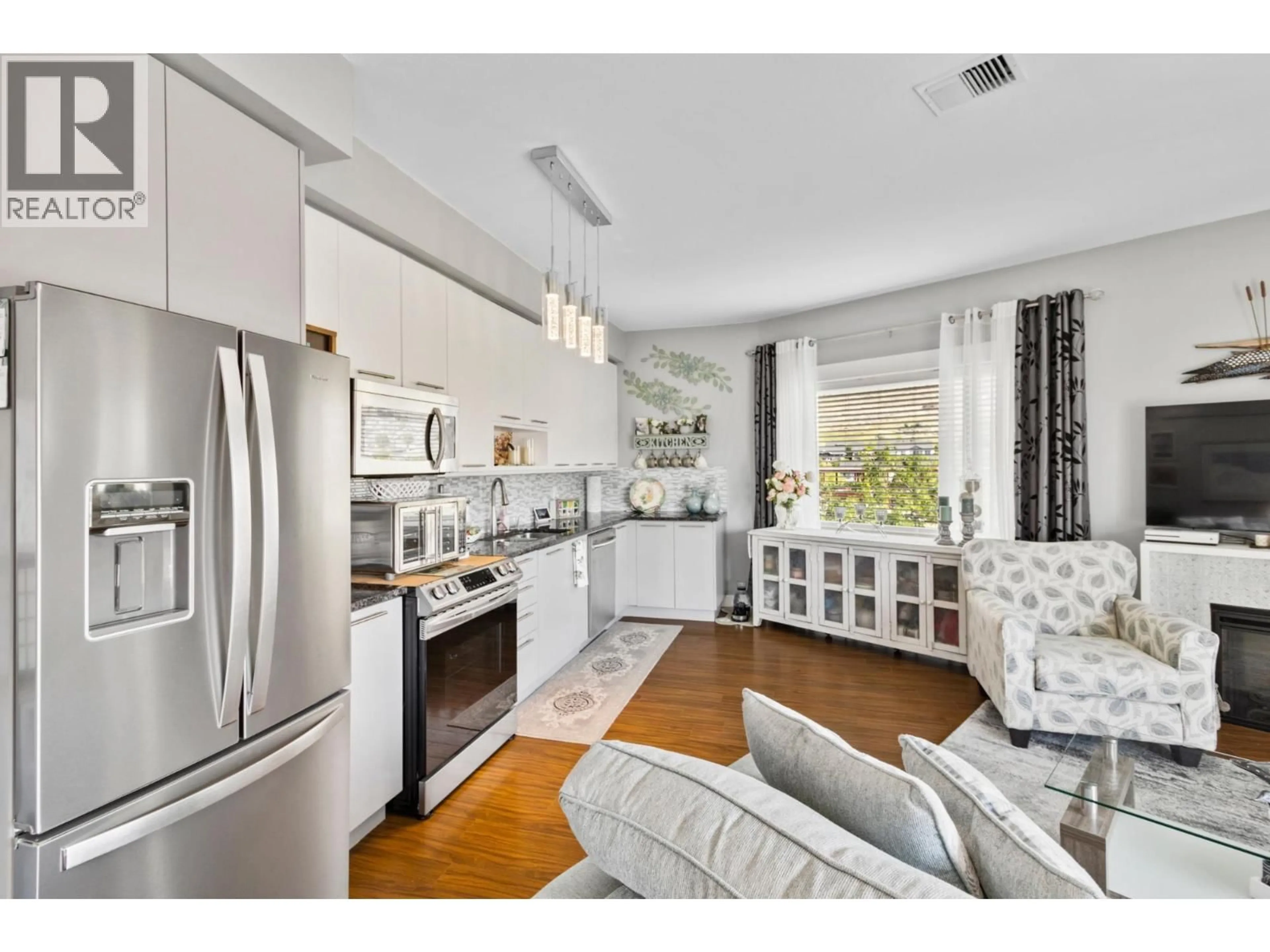 Open concept kitchen, unknown for 2413 - 1030 TALASA WAY, Kamloops British Columbia V2H0C3