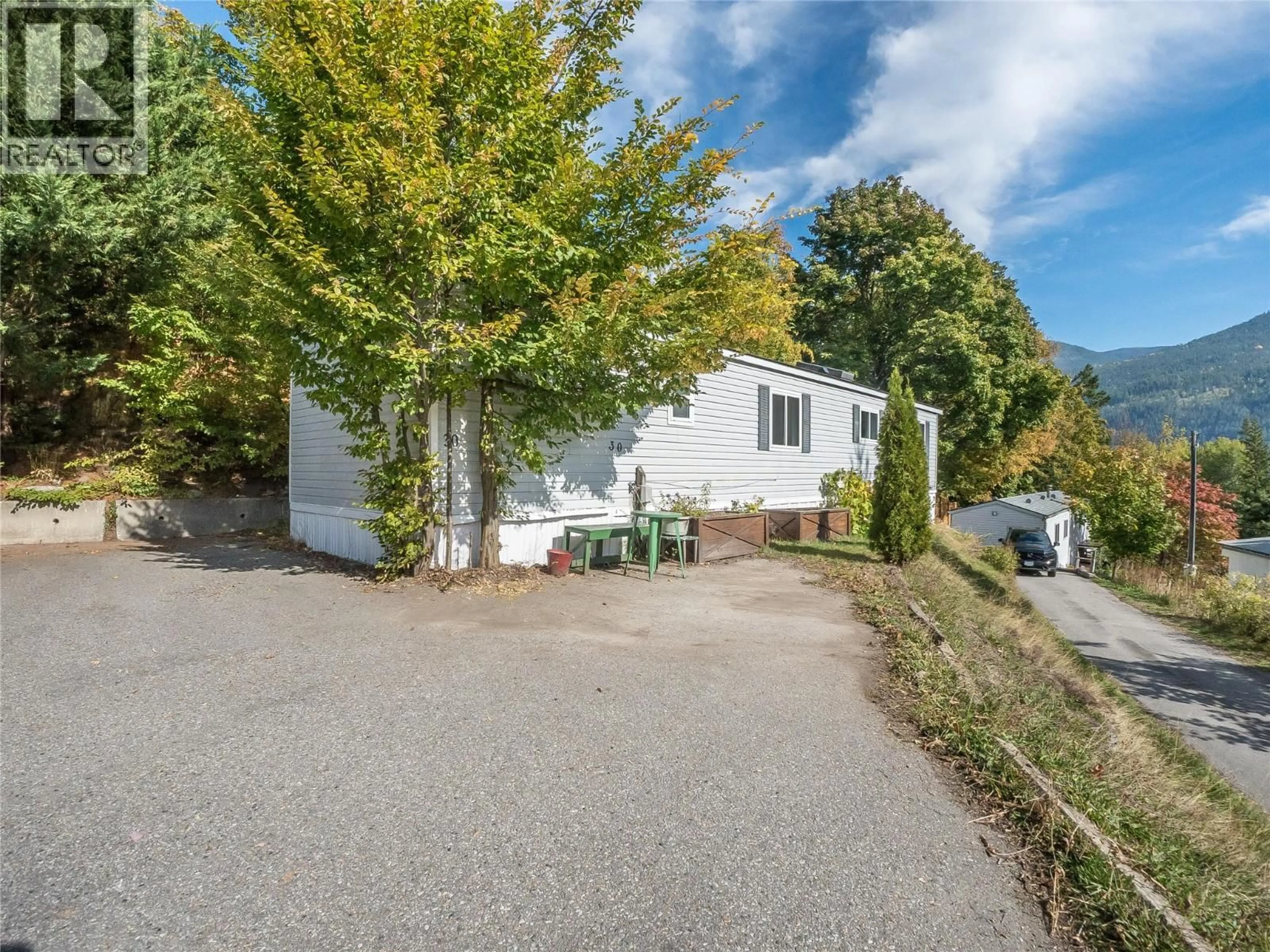 A pic from outside/outdoor area/front of a property/back of a property/a pic from drone, street for 30 - 739 HIGHWAY 3A HIGHWAY, Nelson British Columbia V1L6M4