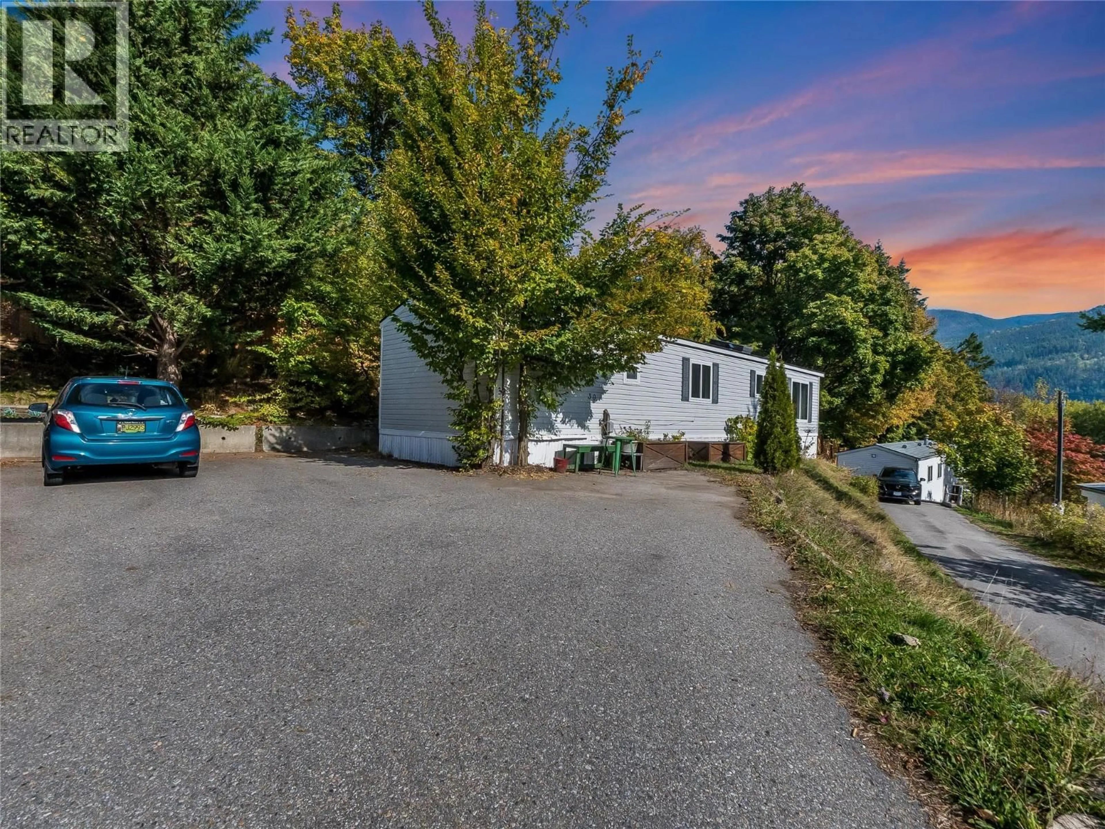A pic from outside/outdoor area/front of a property/back of a property/a pic from drone, street for 30 - 739 HIGHWAY 3A HIGHWAY, Nelson British Columbia V1L6M4