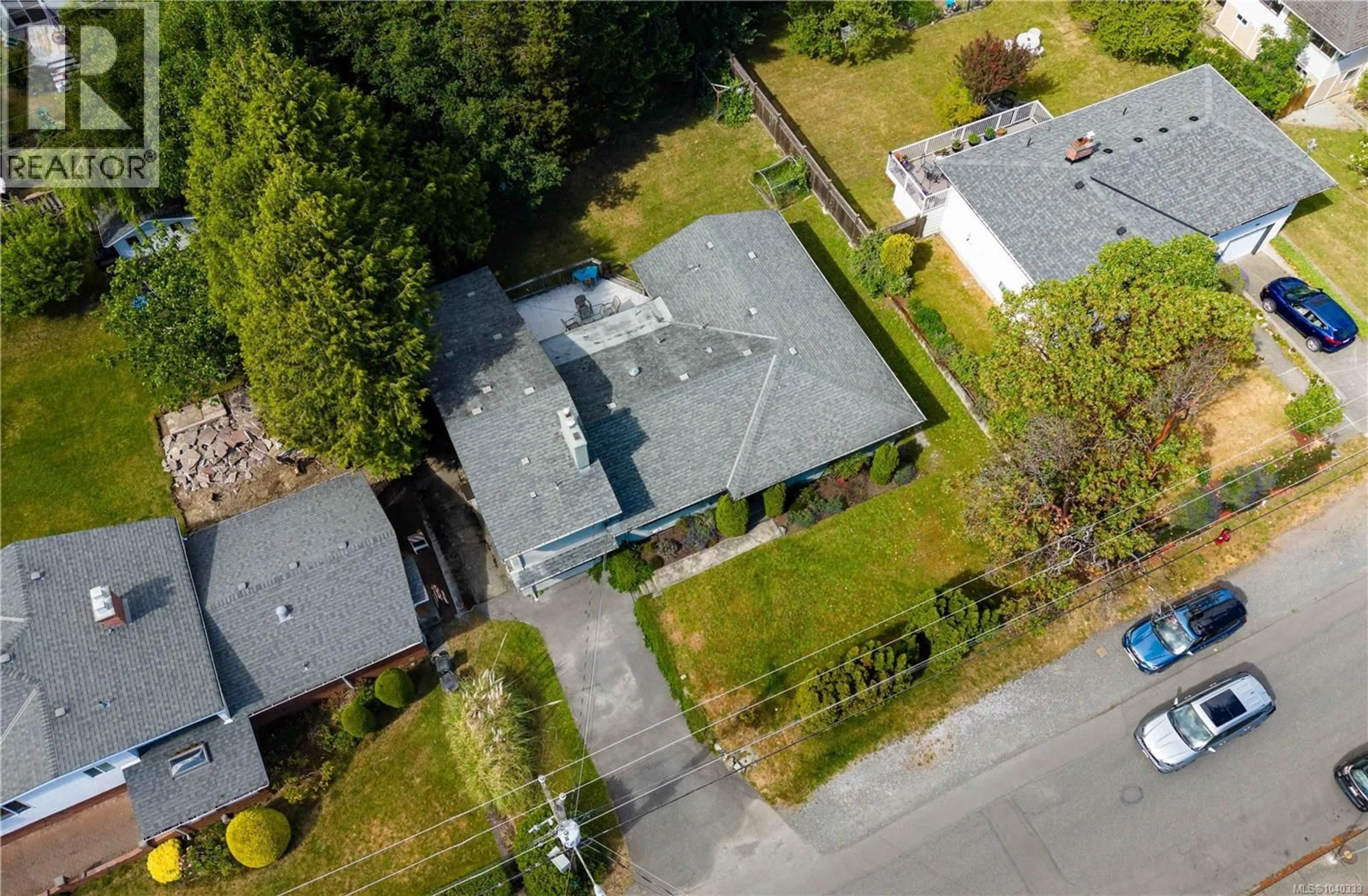 A pic from outside/outdoor area/front of a property/back of a property/a pic from drone, street for 1846 FAIRBURN DRIVE, Saanich British Columbia V8N1P9