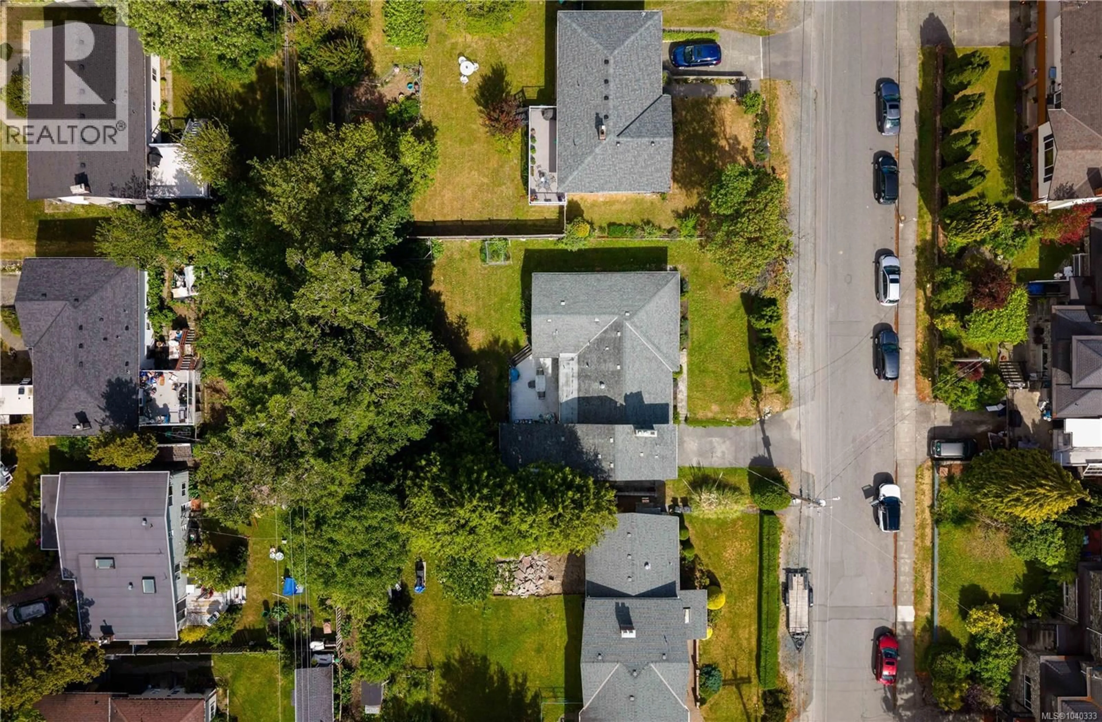 A pic from outside/outdoor area/front of a property/back of a property/a pic from drone, street for 1846 FAIRBURN DRIVE, Saanich British Columbia V8N1P9