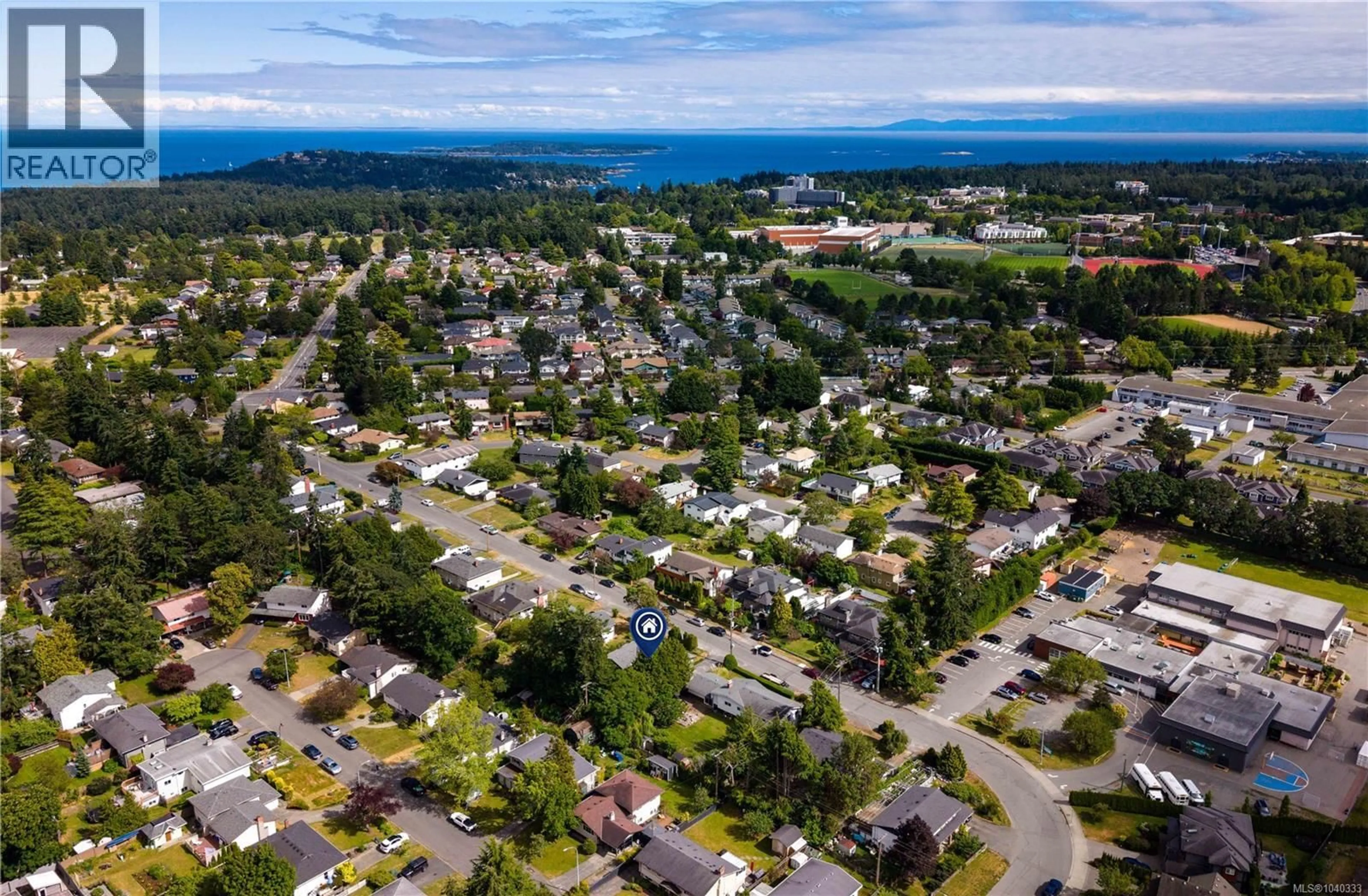A pic from outside/outdoor area/front of a property/back of a property/a pic from drone, street for 1846 FAIRBURN DRIVE, Saanich British Columbia V8N1P9