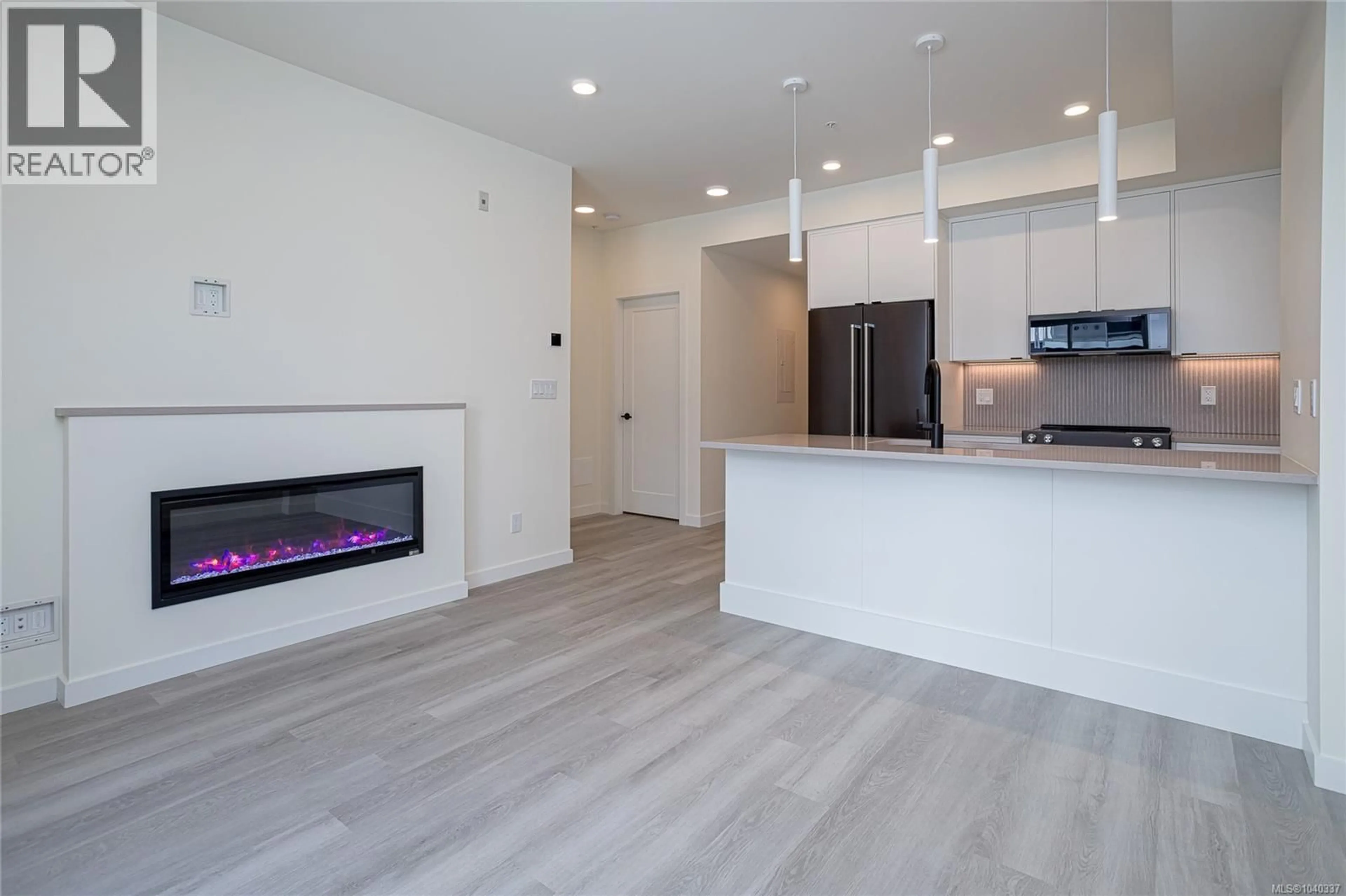 Open concept kitchen, unknown for 304 - 1102 ESQUIMALT ROAD, Esquimalt British Columbia V9A0L3