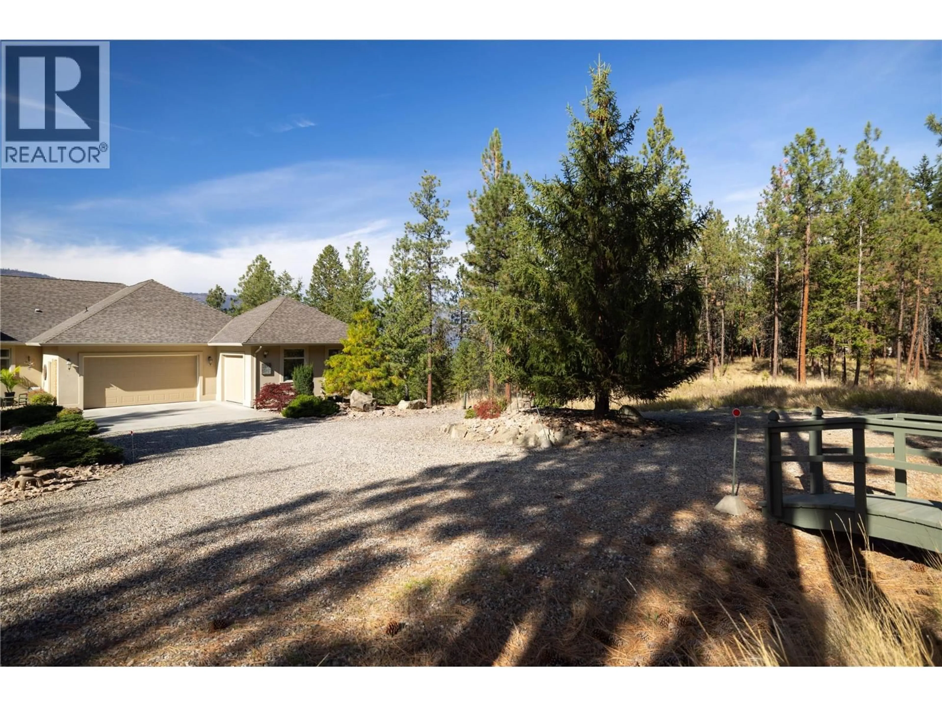 A pic from outside/outdoor area/front of a property/back of a property/a pic from drone, unknown for 5812 MCCOUBREY ROAD, Lake Country British Columbia V4V2L3