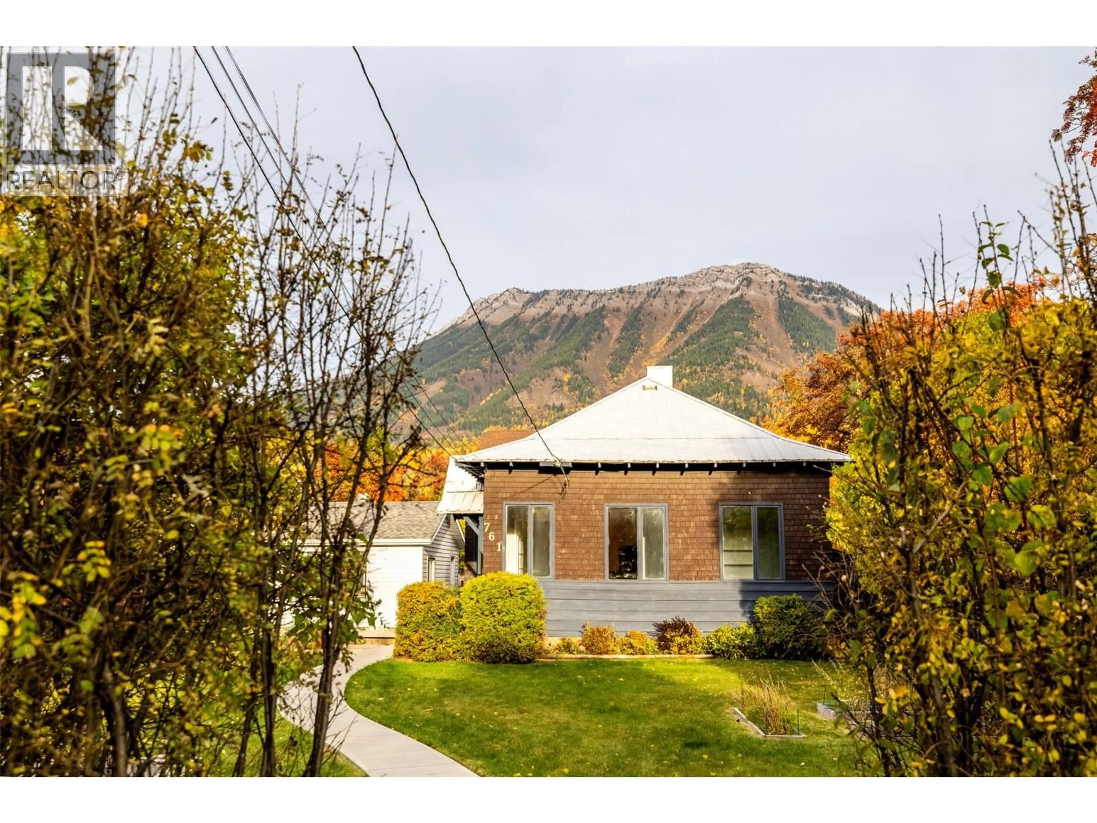 Home with vinyl exterior material, mountain view for 761 4TH AVENUE, Fernie British Columbia V0B1M0