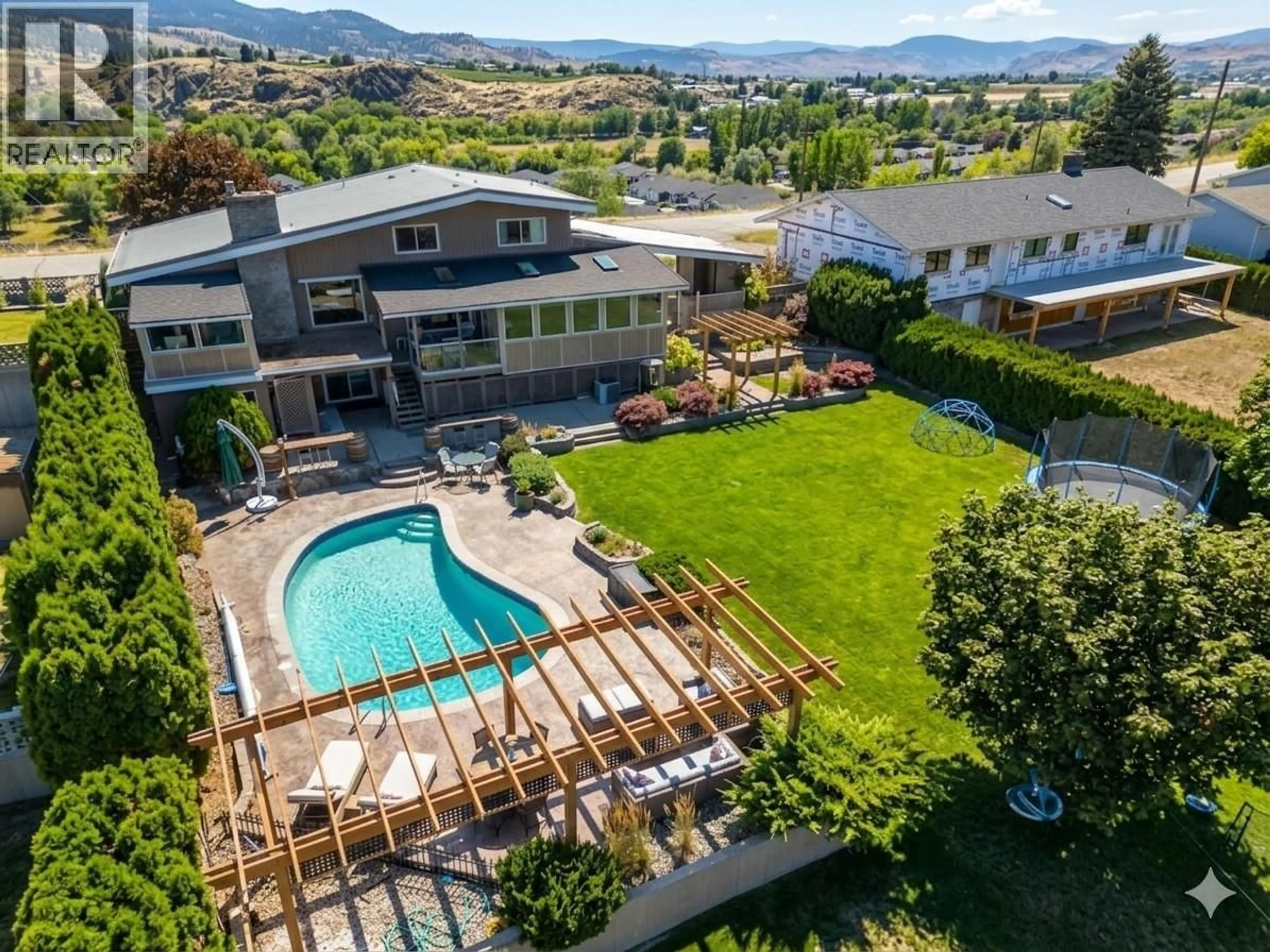 A pic from outside/outdoor area/front of a property/back of a property/a pic from drone, mountain view for 6521 BELLEVUE DRIVE, Oliver British Columbia V0H1T4