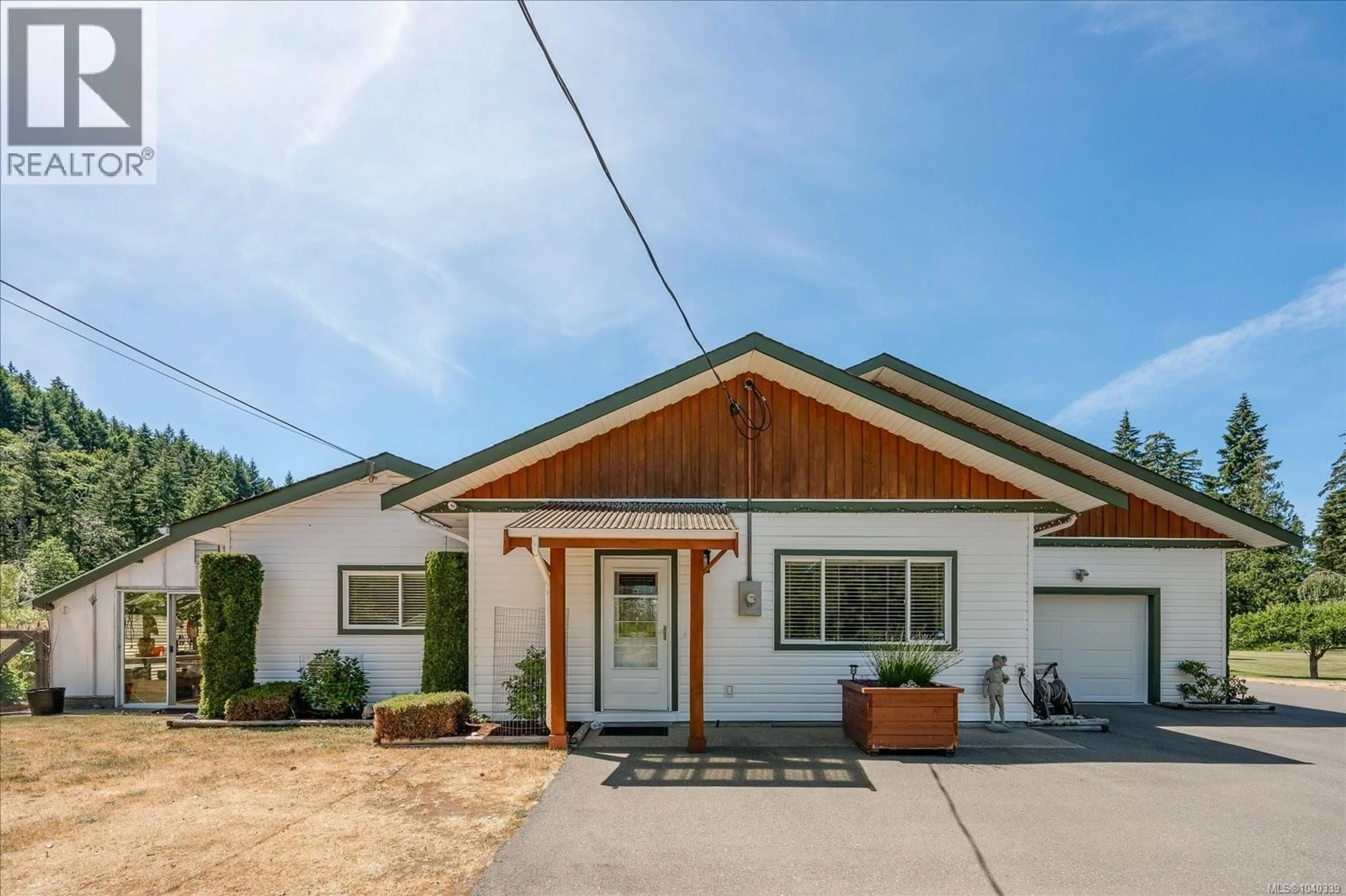 Home with vinyl exterior material, street for 1099 POPHAM ROAD, Parksville British Columbia V9P2T3