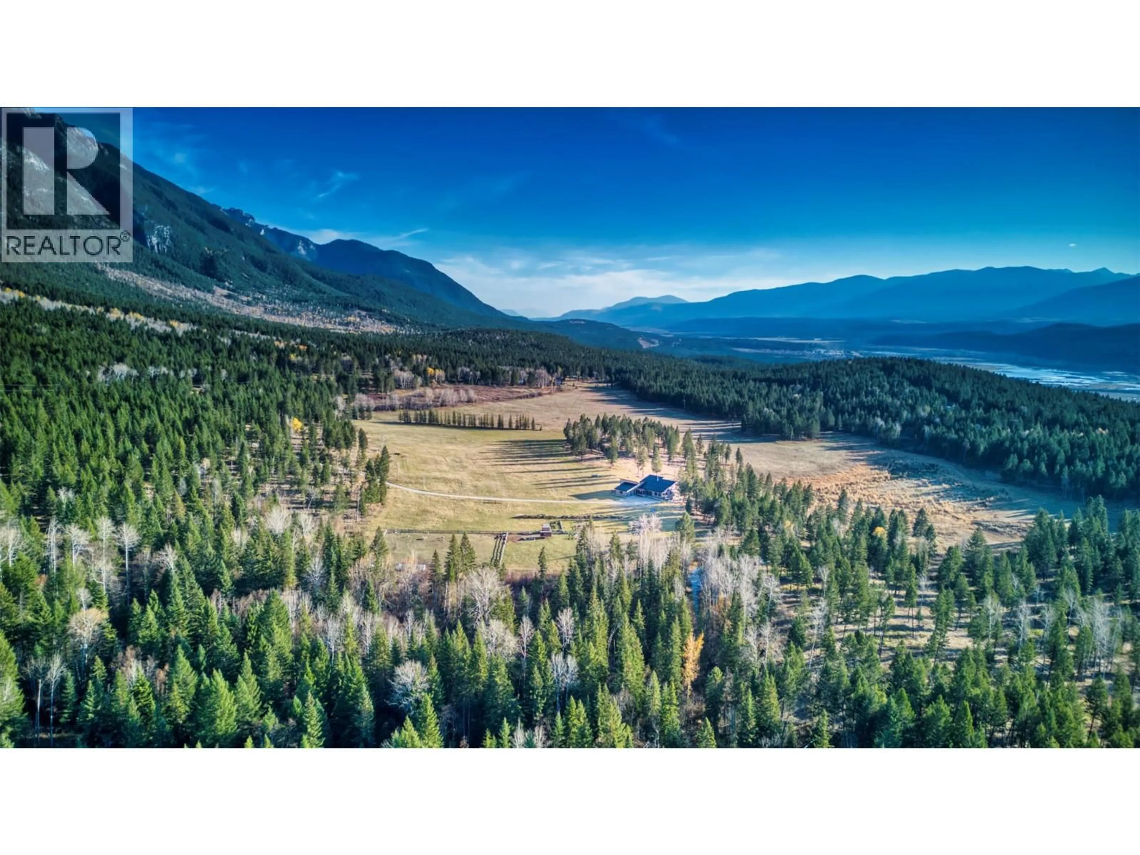 A pic from outside/outdoor area/front of a property/back of a property/a pic from drone, mountain view for 6211 BUGABOO DRIVE, Radium Hot Springs British Columbia V0A1E0