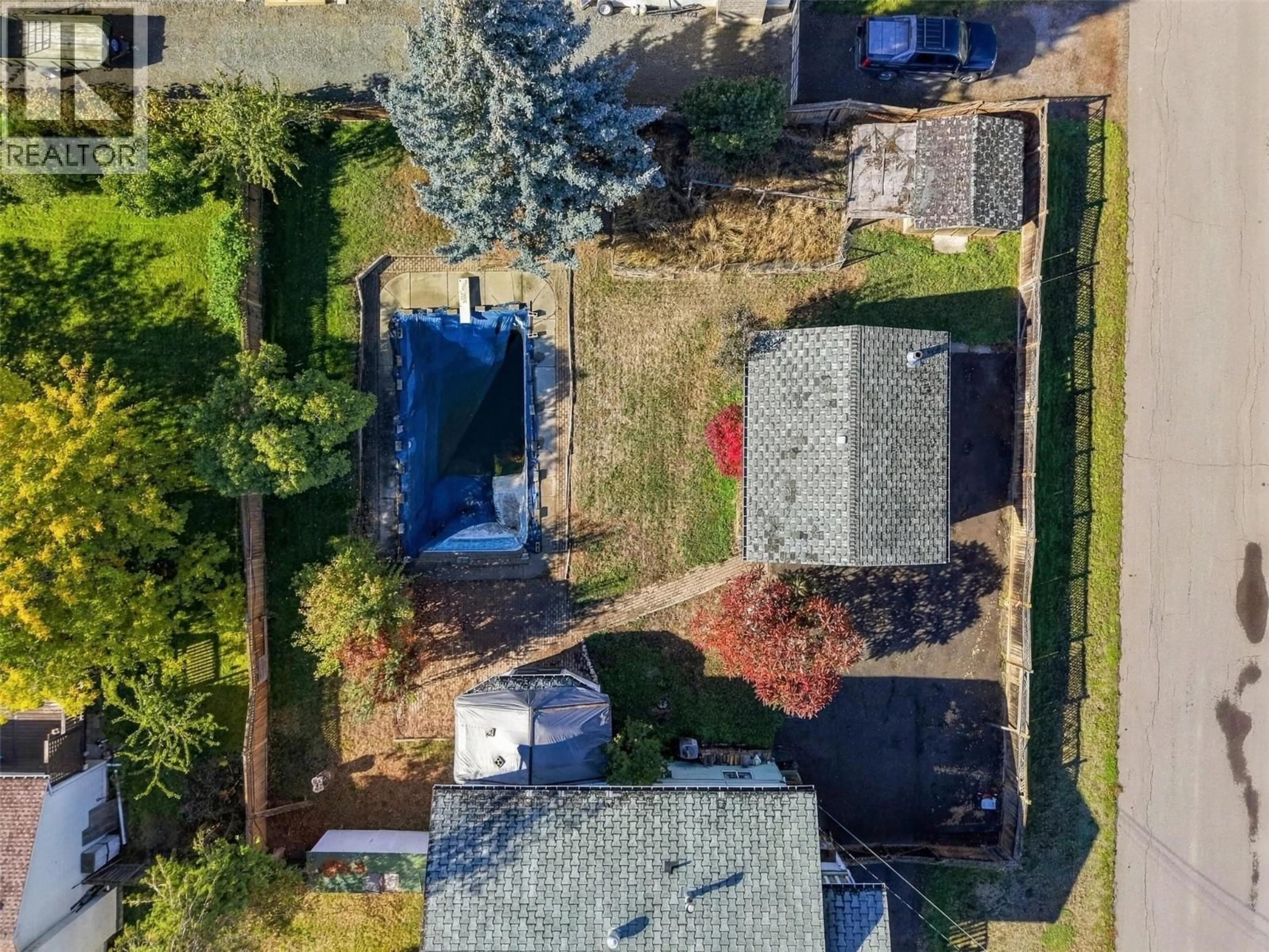 A pic from outside/outdoor area/front of a property/back of a property/a pic from drone, street for 4569 SPURRAWAY ROAD, Kamloops British Columbia V2H1M8