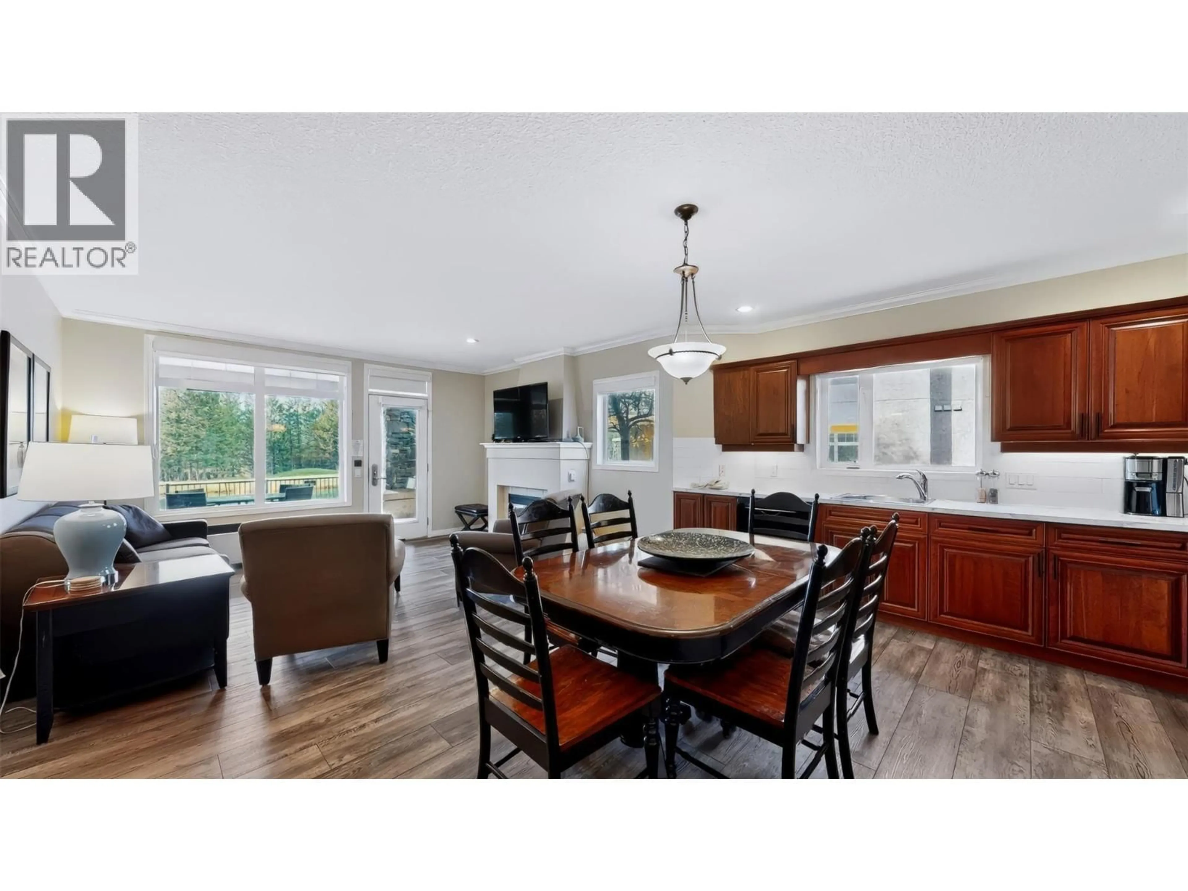 Open concept kitchen, wood/laminate floor for 105 B - 100 BIGHORN BOULEVARD, Radium Hot Springs British Columbia V0A1M0
