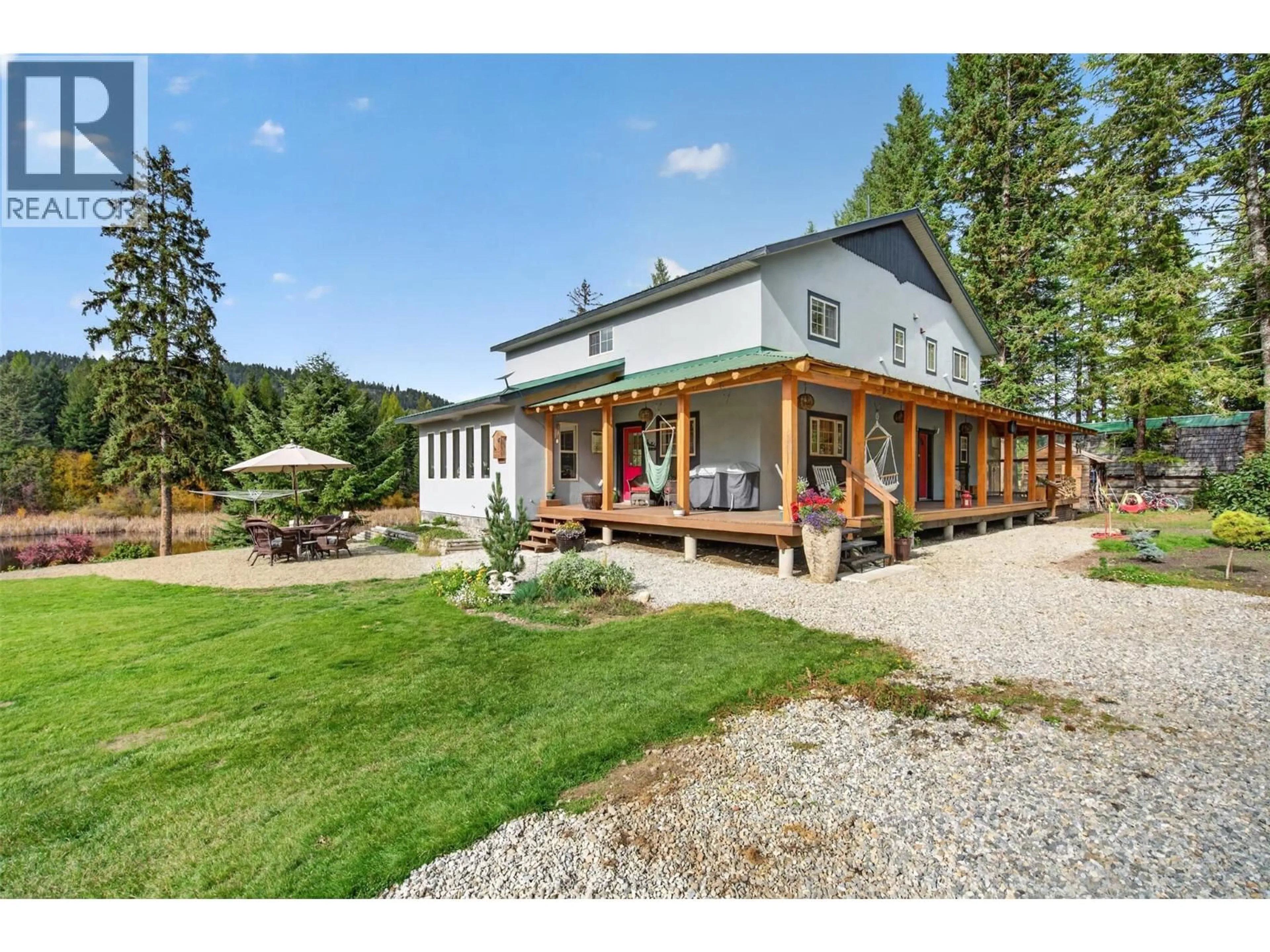 A pic from outside/outdoor area/front of a property/back of a property/a pic from drone, building for 1770 JOHNSTONE CREEK ROAD WEST, Rock Creek British Columbia V0H1Y0