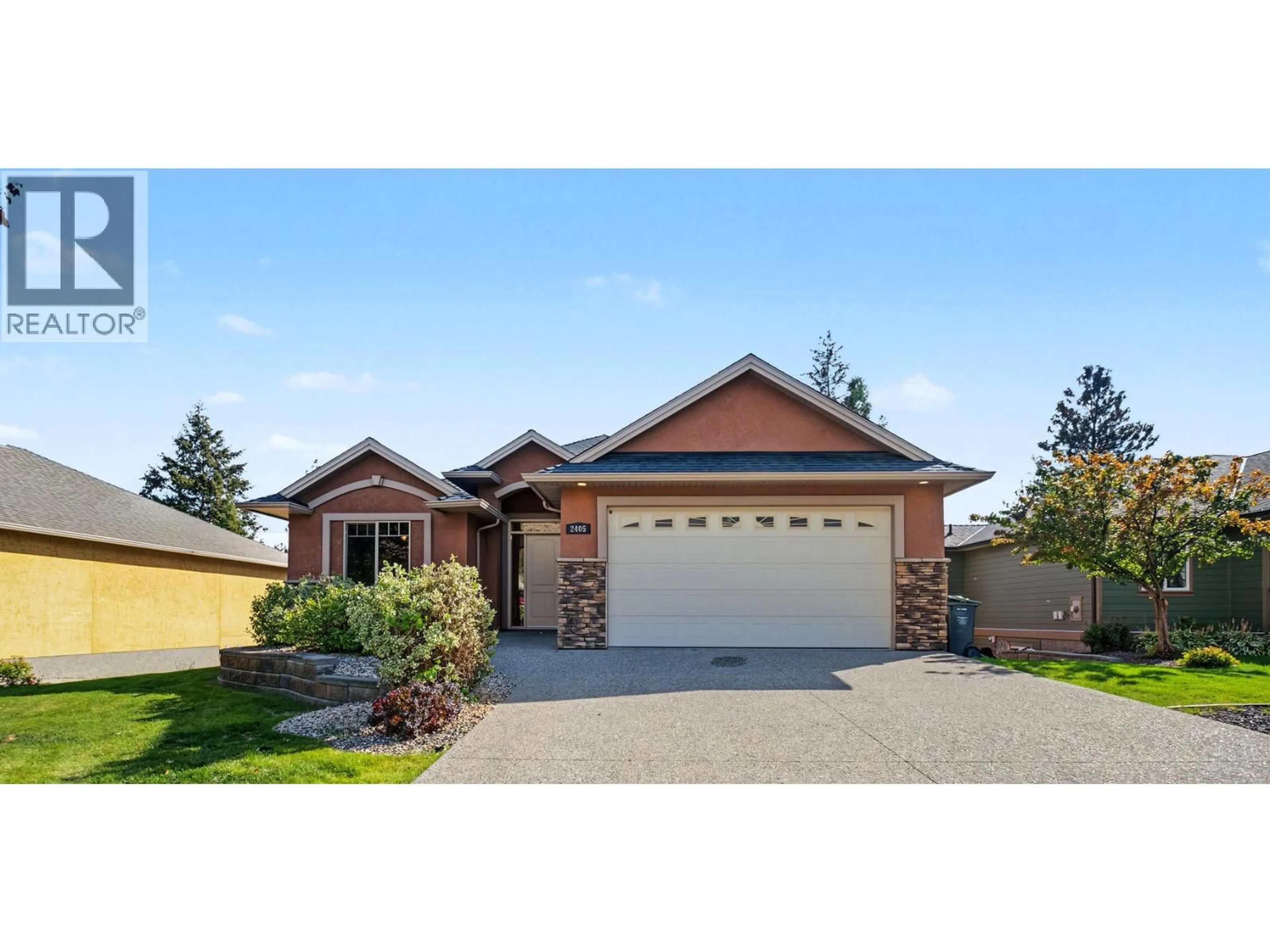 Home with brick exterior material, street for 2405 COBBLESTONE ROAD, West Kelowna British Columbia V4T3A7