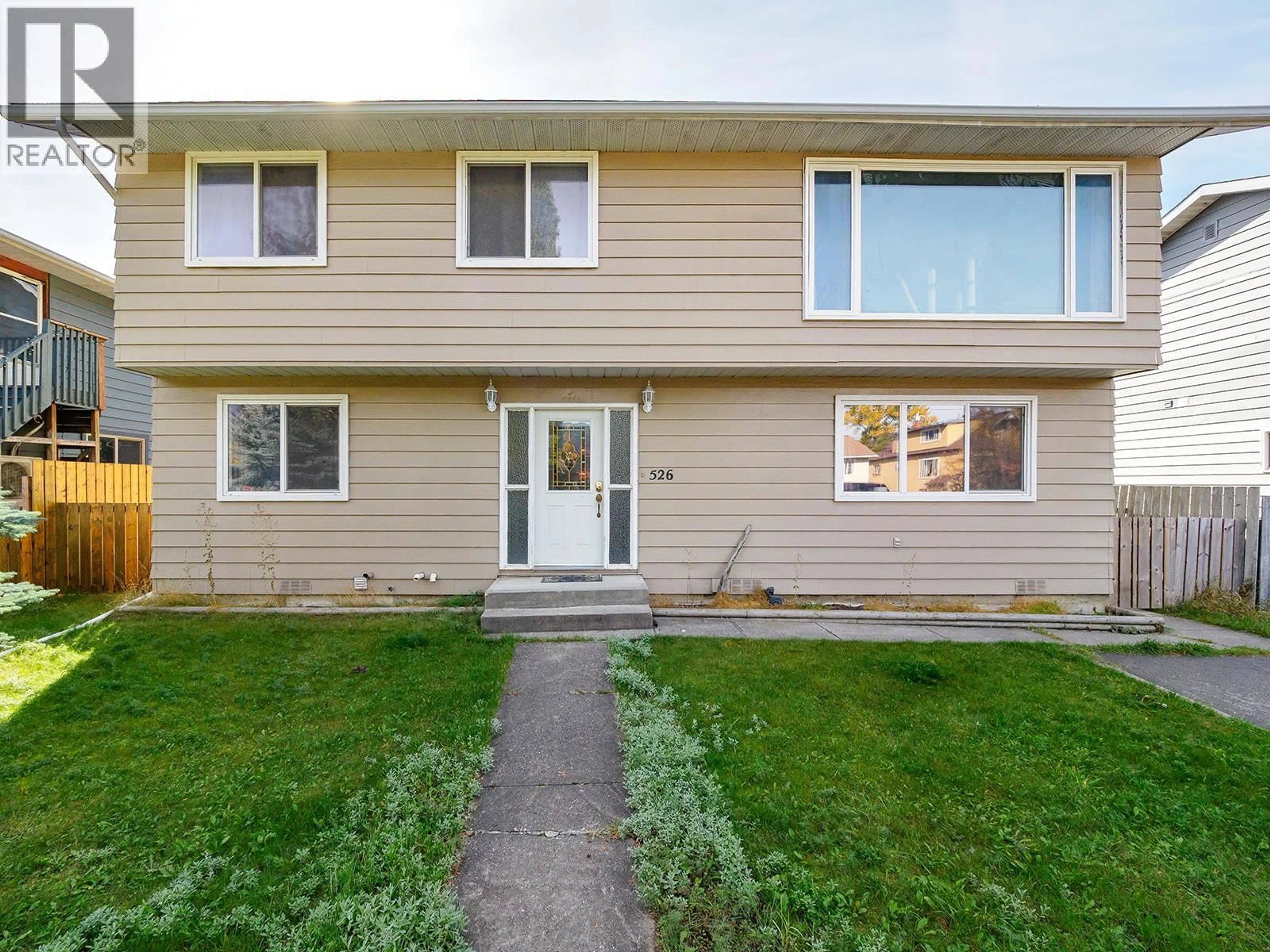 Home with vinyl exterior material, street for 526 12TH STREET, Golden British Columbia V0A1H0