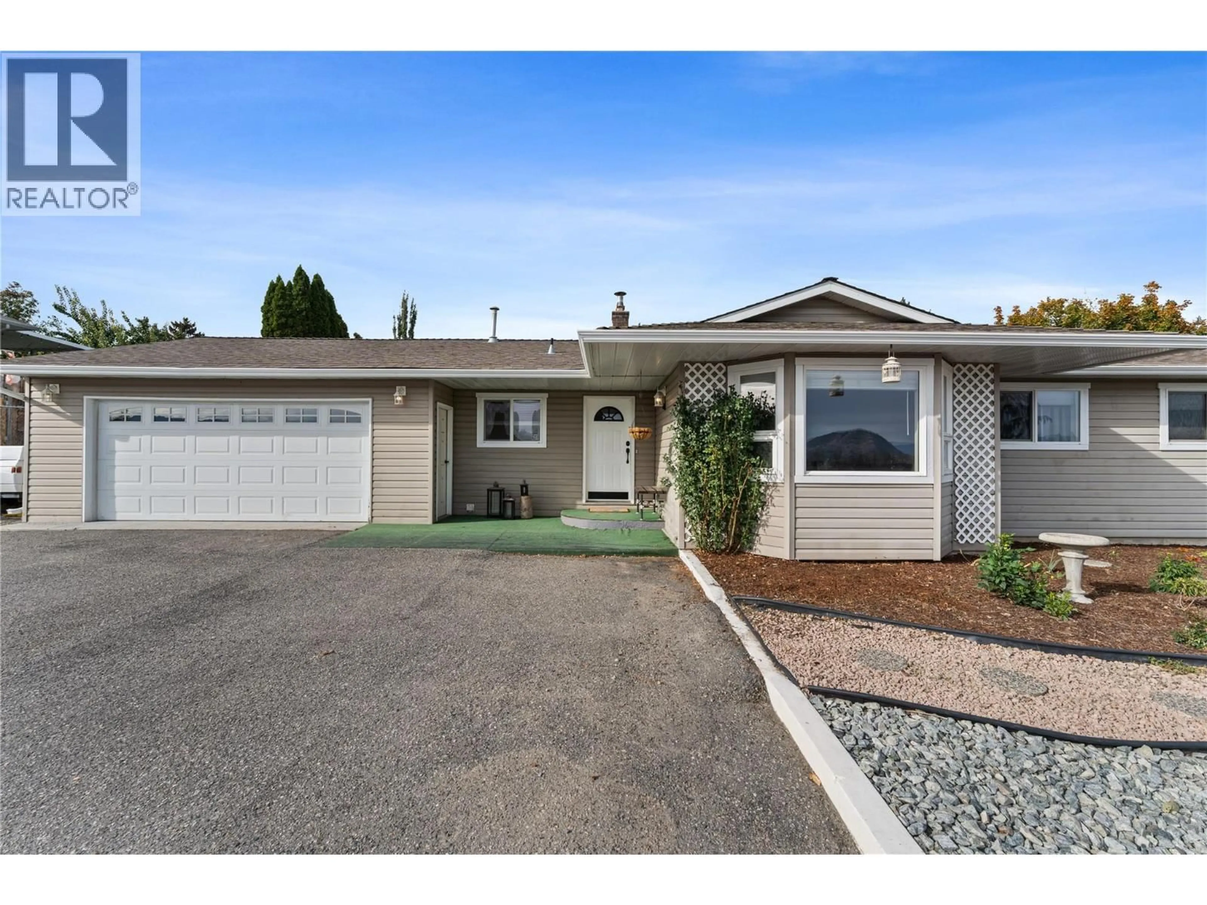 Home with vinyl exterior material, street for 3772 GLENWAY ROAD, West Kelowna British Columbia V4T1E3