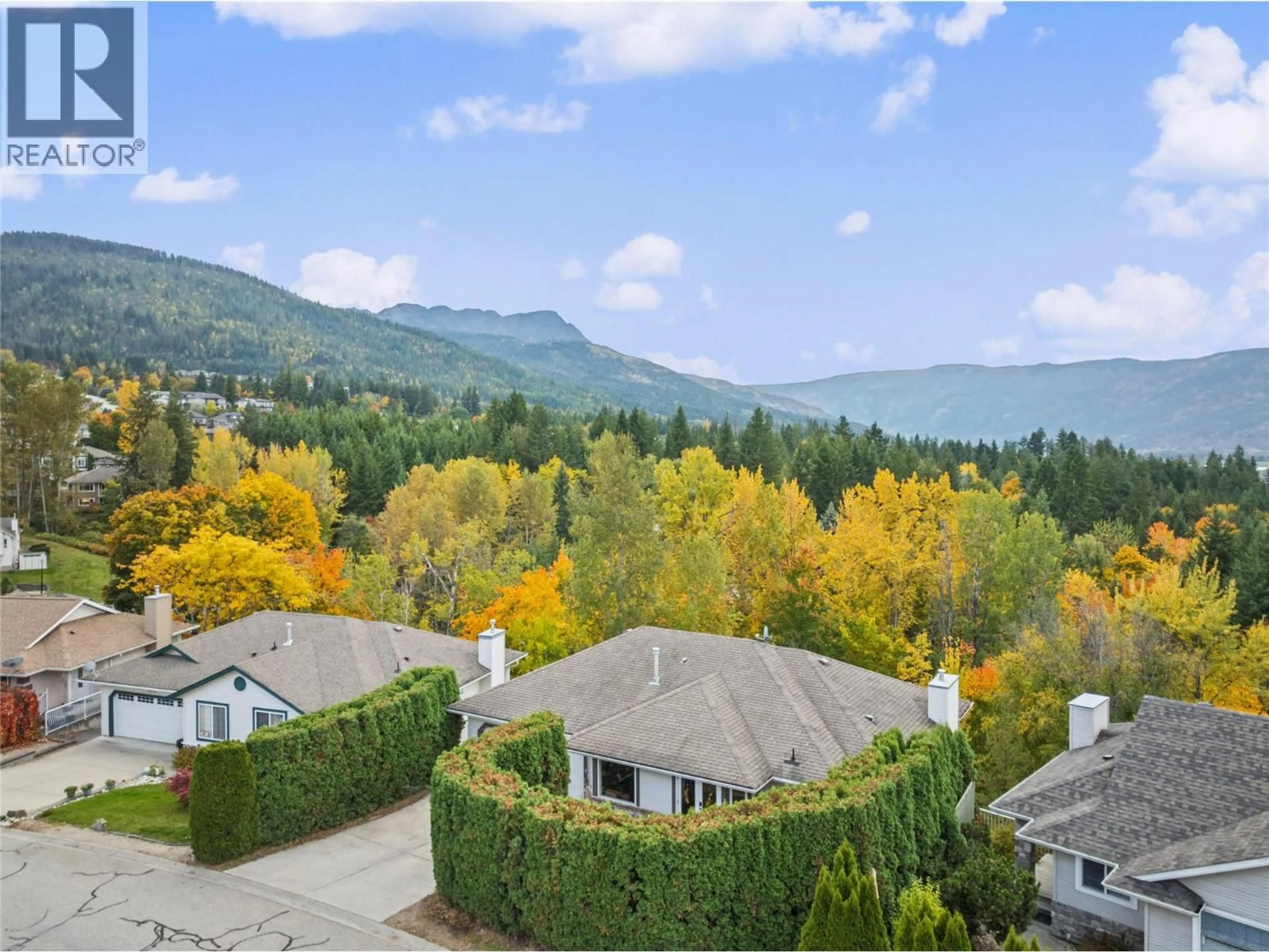 A pic from outside/outdoor area/front of a property/back of a property/a pic from drone, mountain view for 251 17 STREET SOUTHEAST, Salmon Arm British Columbia V1E1R7